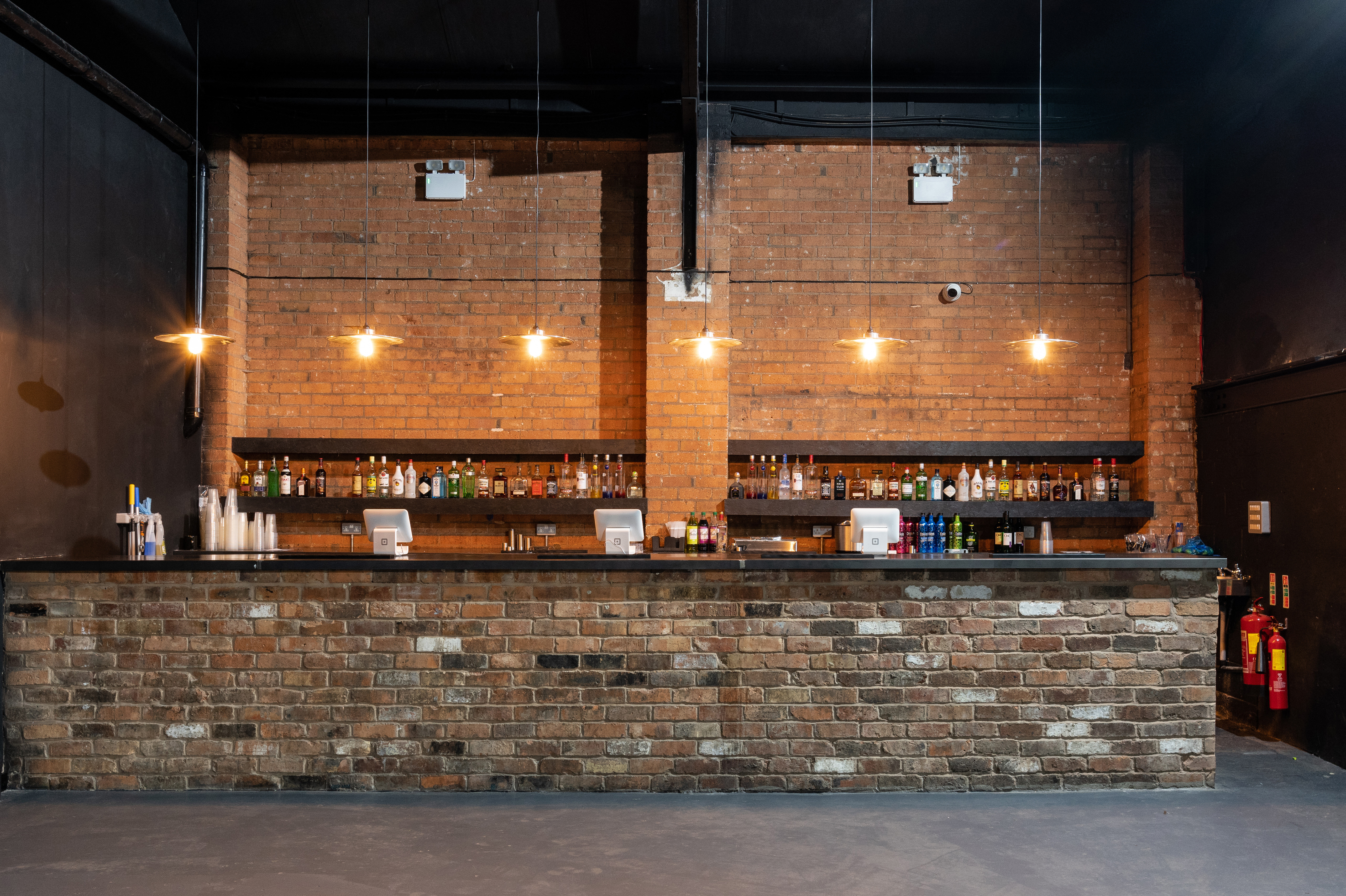 Sleek bar setup in XOYO Birmingham, ideal for cocktail receptions and networking events.