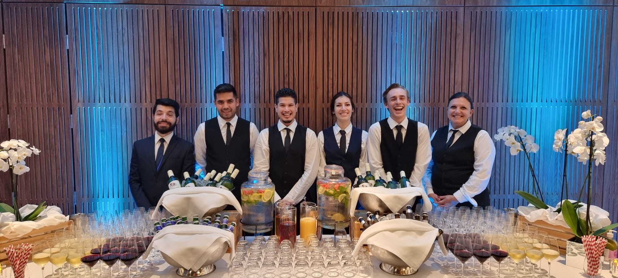 Beverage station at Elizabeth Room event with elegant glassware and attentive servers.