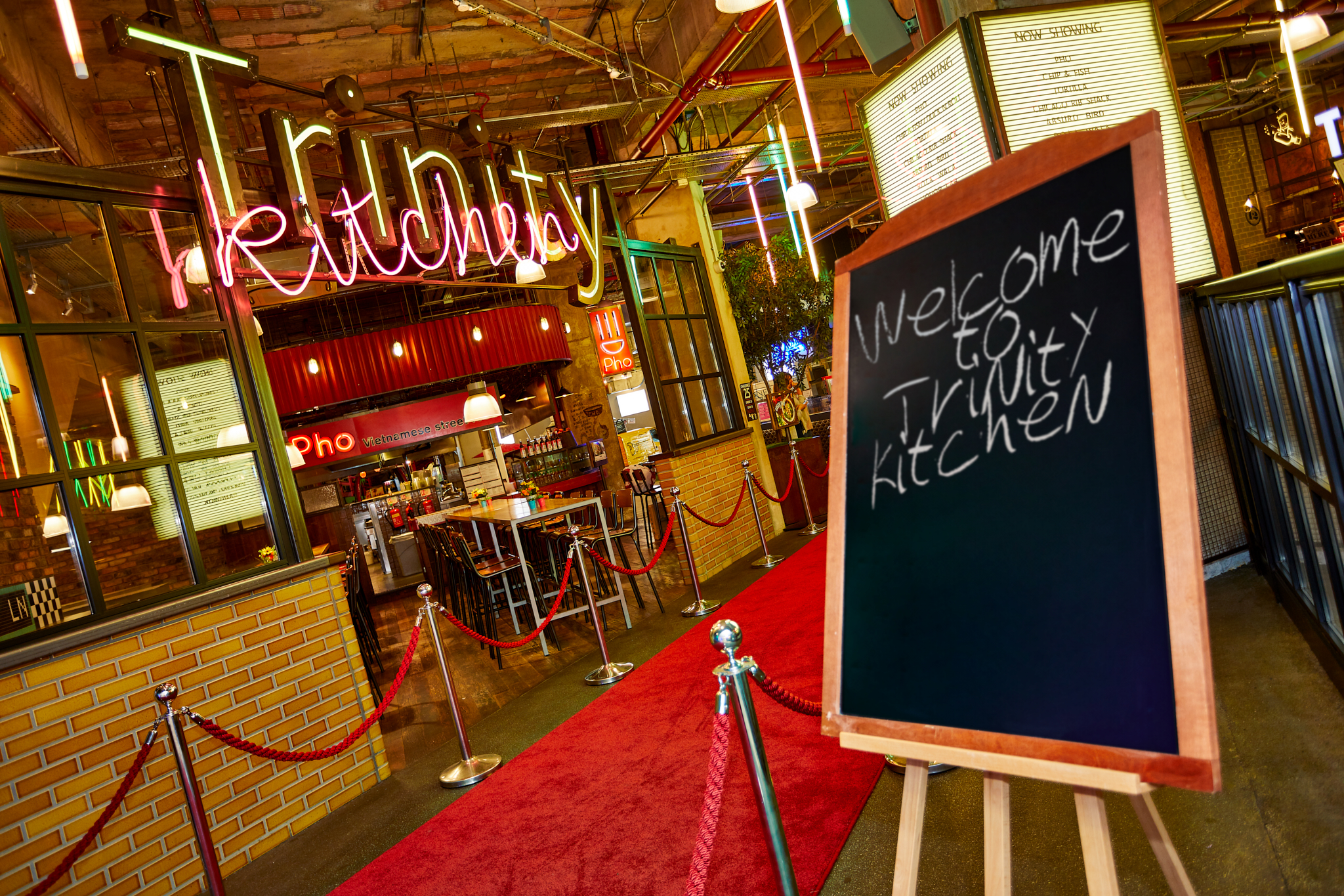 Urban Park event space with neon signage, ideal for networking and social gatherings.