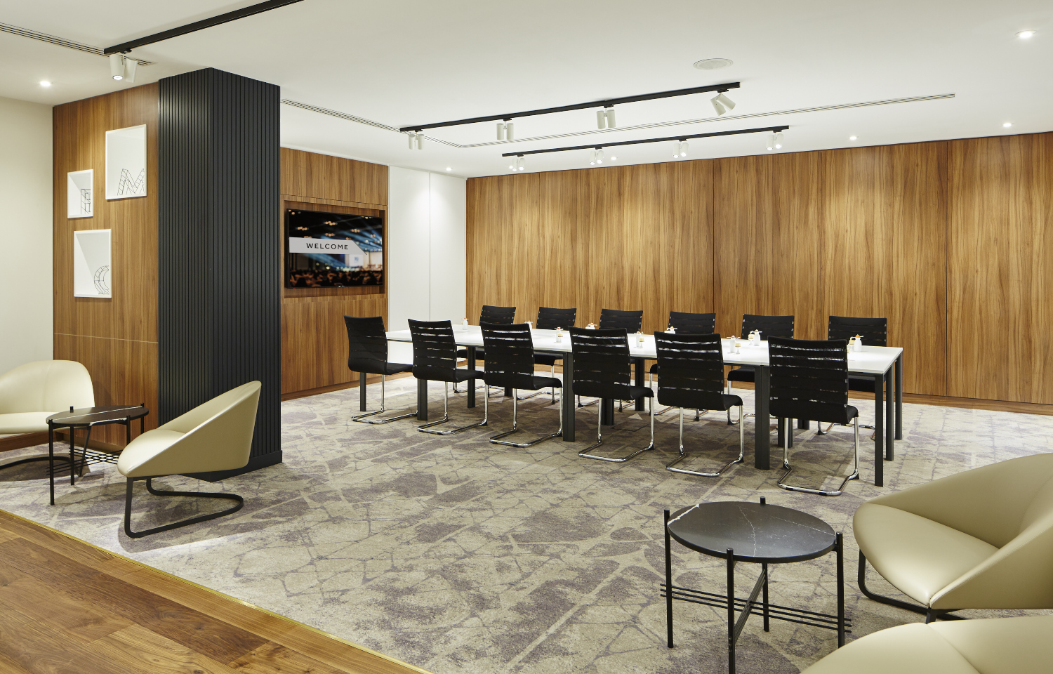 Modern boardroom at London Heathrow Marriott, ideal for meetings and presentations.