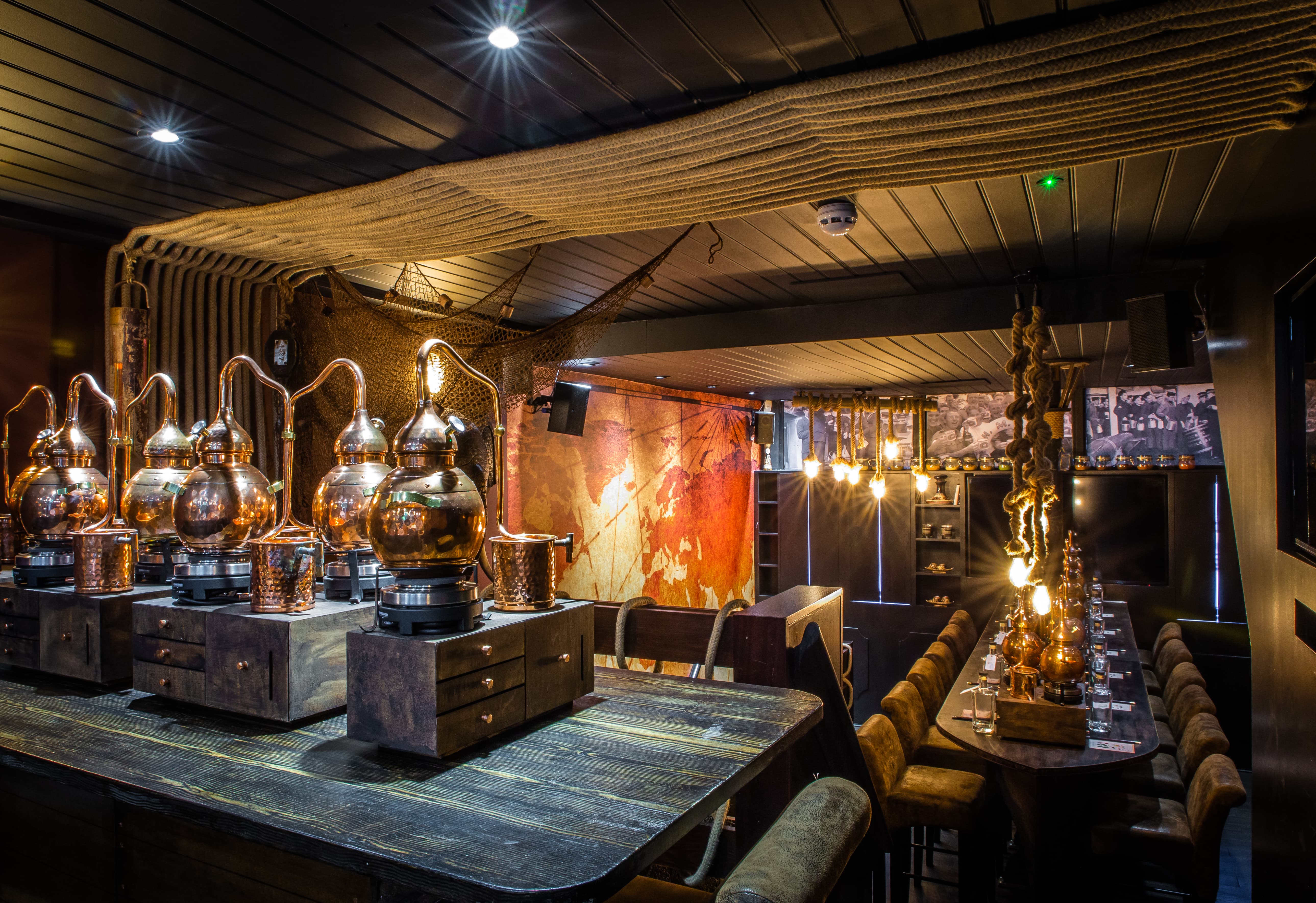 Beach Rum Distillery event space with copper distillation equipment, ideal for tastings and gatherings.