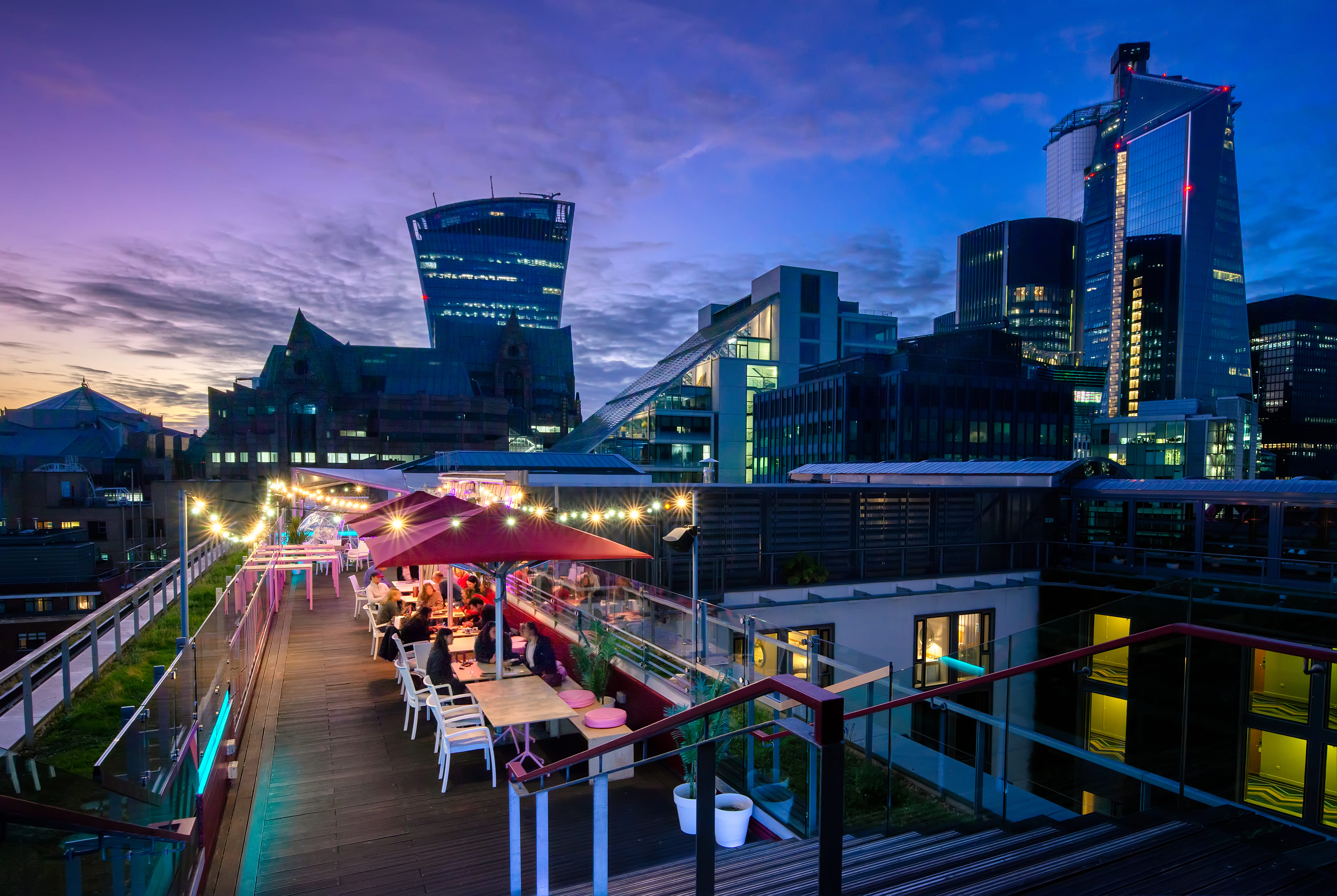 Vibrant rooftop event space at DoubleTree by Hilton, ideal for networking and receptions.