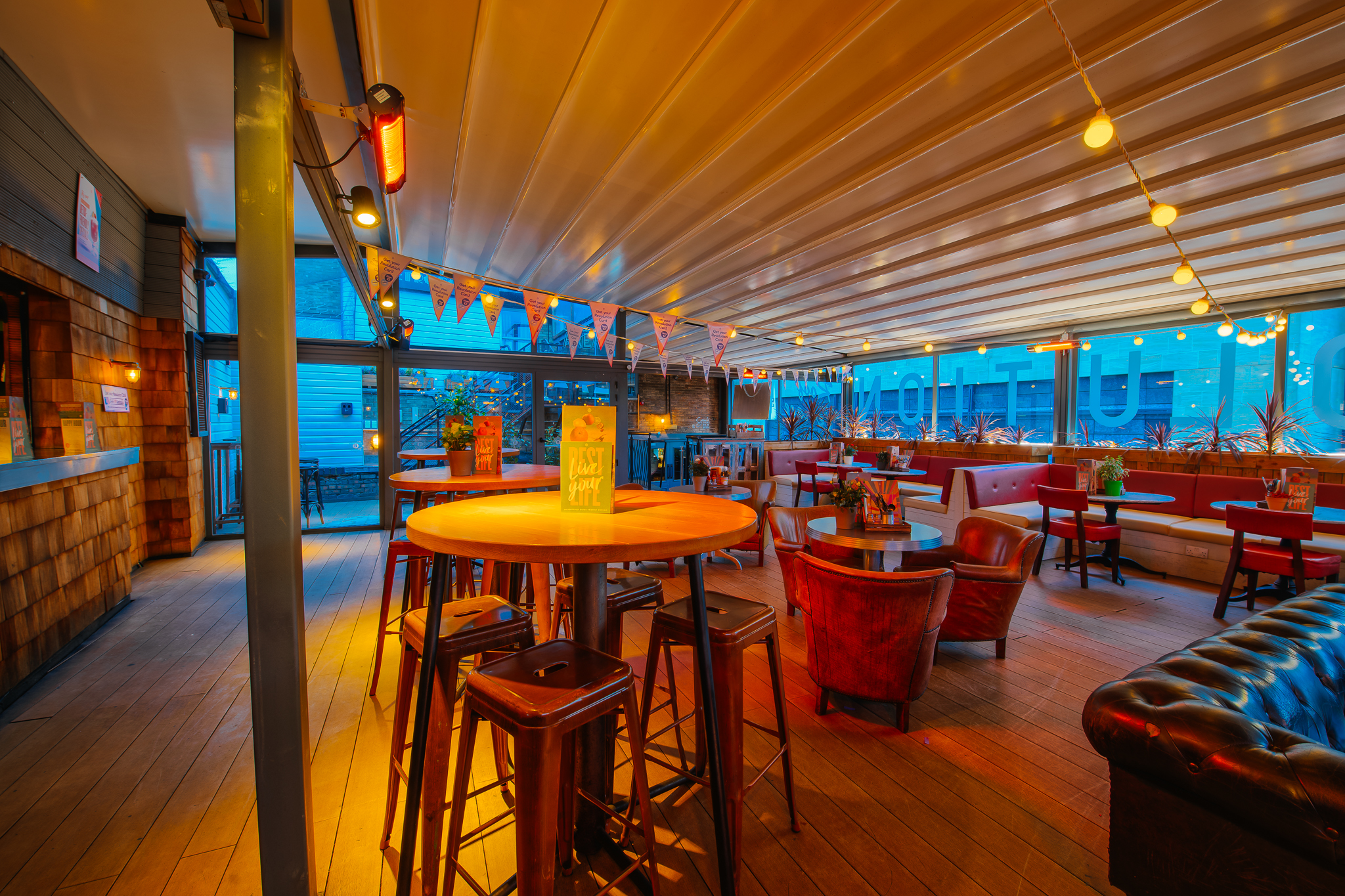 Rooftop Bar in Revolution Cambridge, vibrant event space with stylish seating for gatherings.