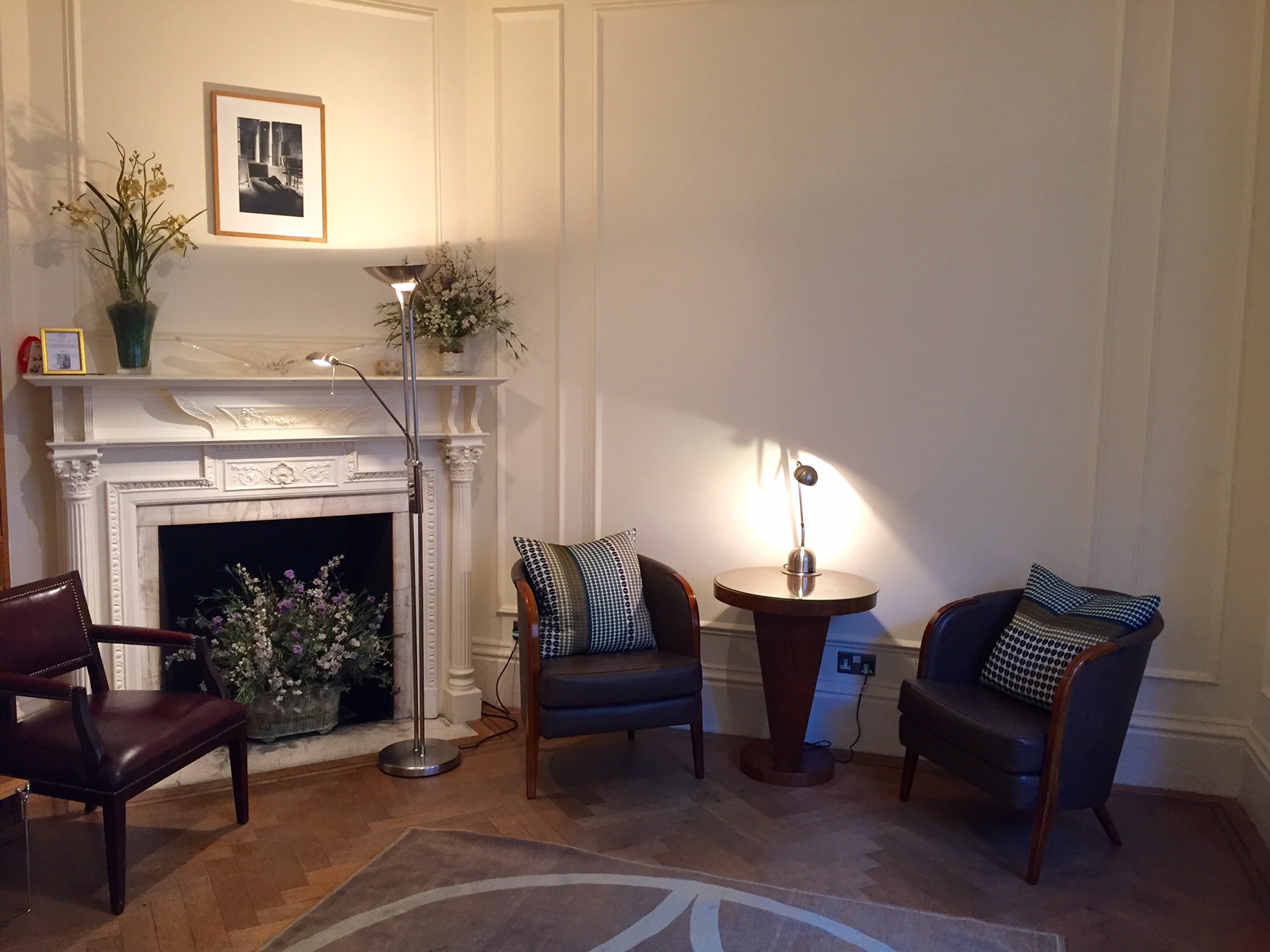 Cozy consulting room with armchairs for professional meetings and informal discussions.