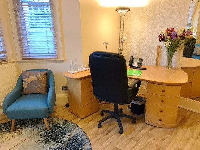 Consulting Room 5 at Wilbraham Place: organized workspace for meetings and events.