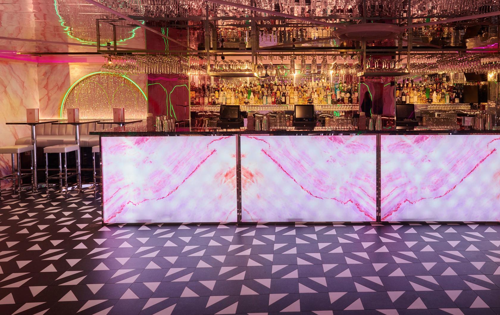 Vibrant bar area at Tonight Josephine Shoreditch, ideal for upscale cocktail events.