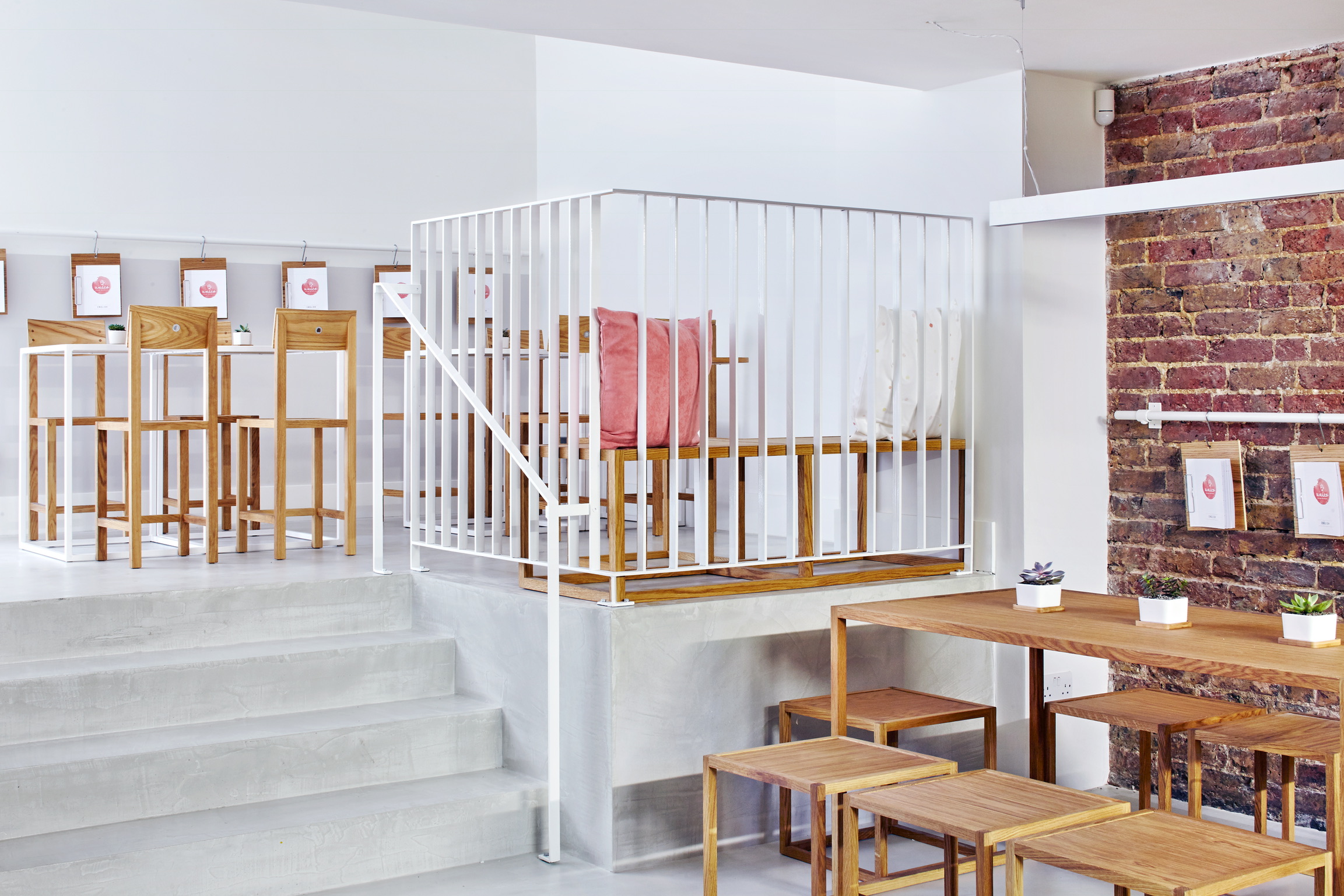 Modern event space at Unico Notting Hill with versatile seating for meetings and gatherings.