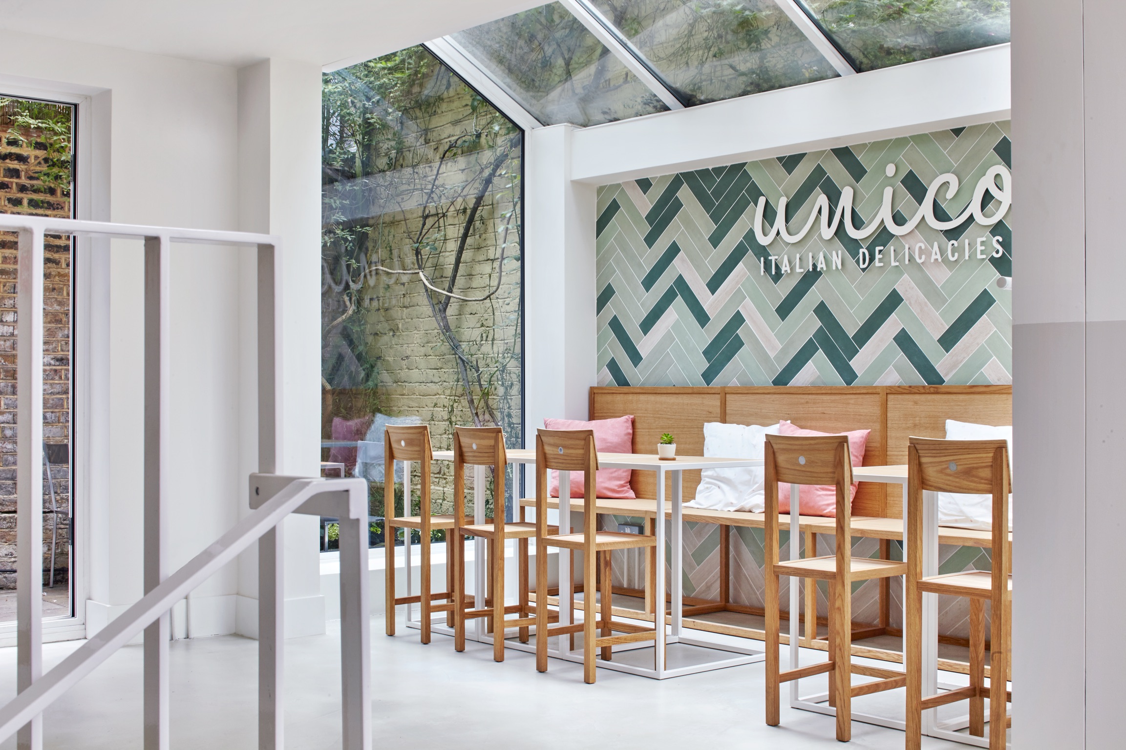 Modern Unico Notting Hill café with stylish seating for networking events and casual meetings.