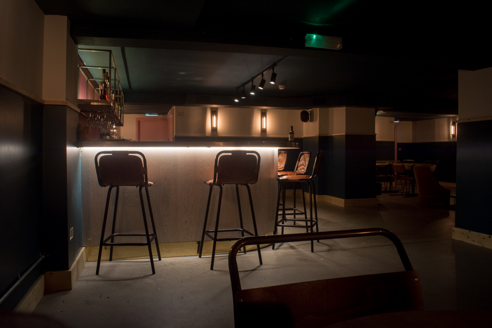 Sleek modern bar at Fanny's, perfect for cocktail receptions and networking events.