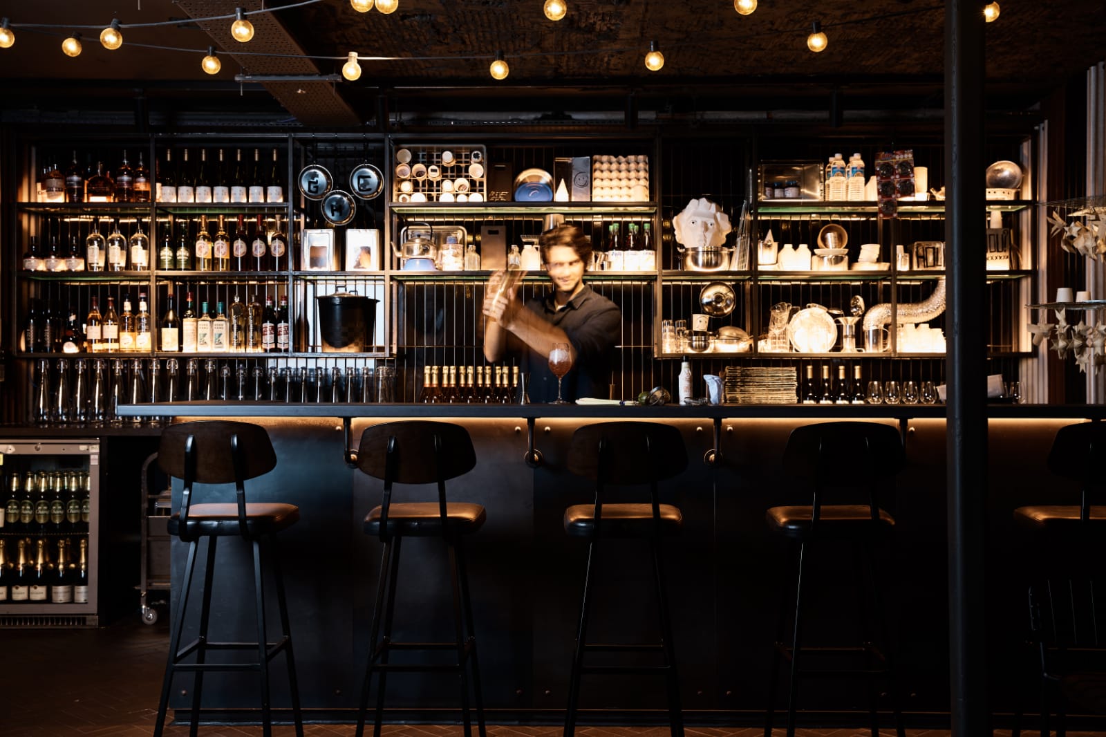 Stylish bar at The Greyhound Cafe, perfect for networking events and cocktail receptions.