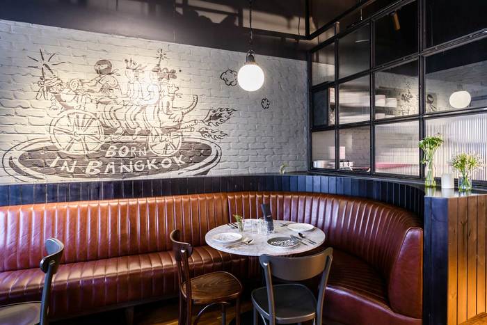 Stylish Bangkok Underground cafe with leather seating, perfect for intimate meetings and events.