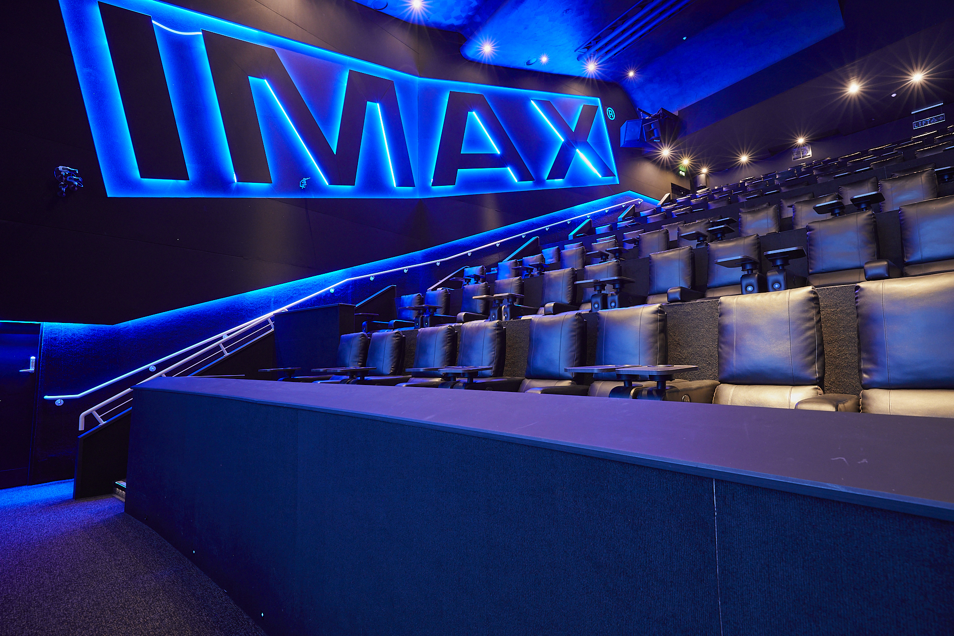 IMAX theater with plush seating at ODEON LUXE Swiss Cottage for corporate events.