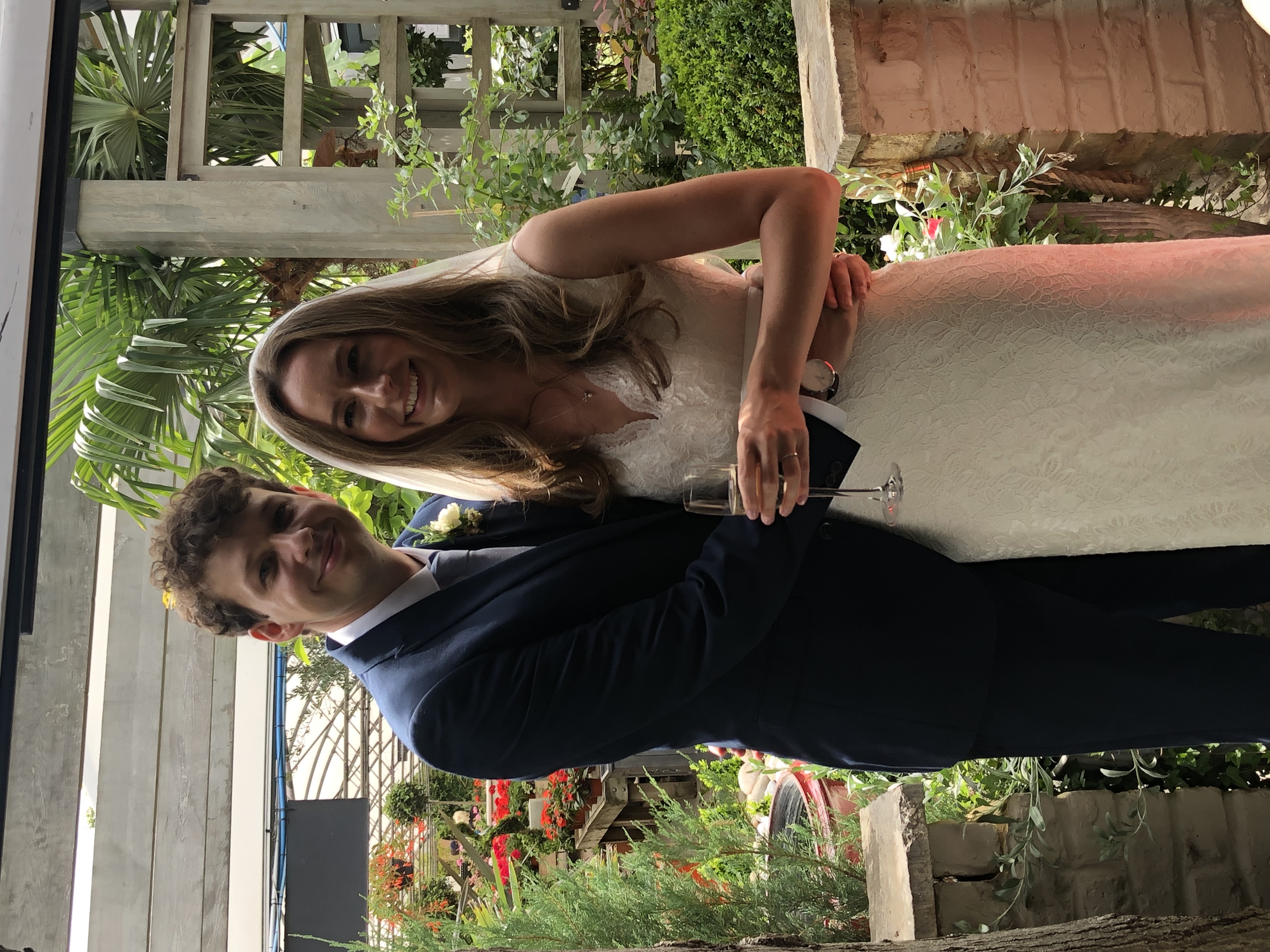 Joyful couple at wedding in lush Mezcalito Venue, perfect for intimate celebrations.