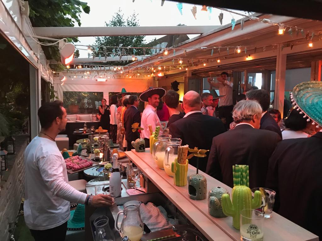 Mezcalito Chelsea Latin party, string lights, outdoor event