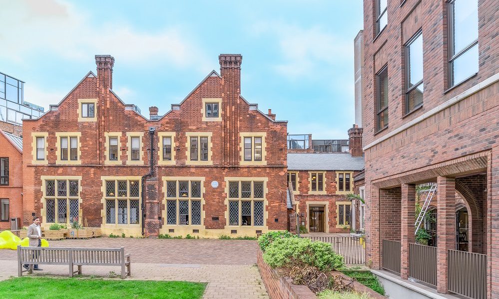 Lecture Hall at Toynbee Hall, historic venue for events with modern architecture.