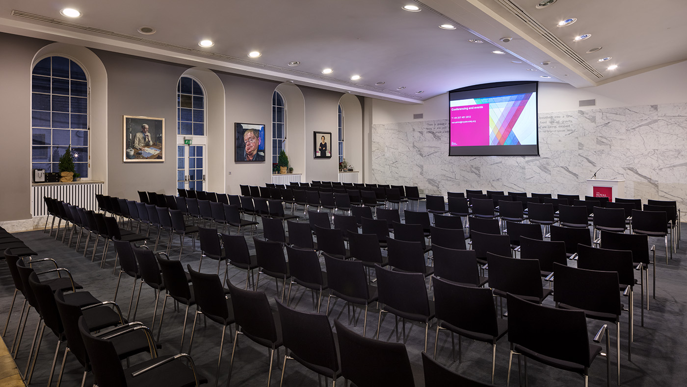 Elegant dining room with black chairs for conferences and seminars at The Royal Society.