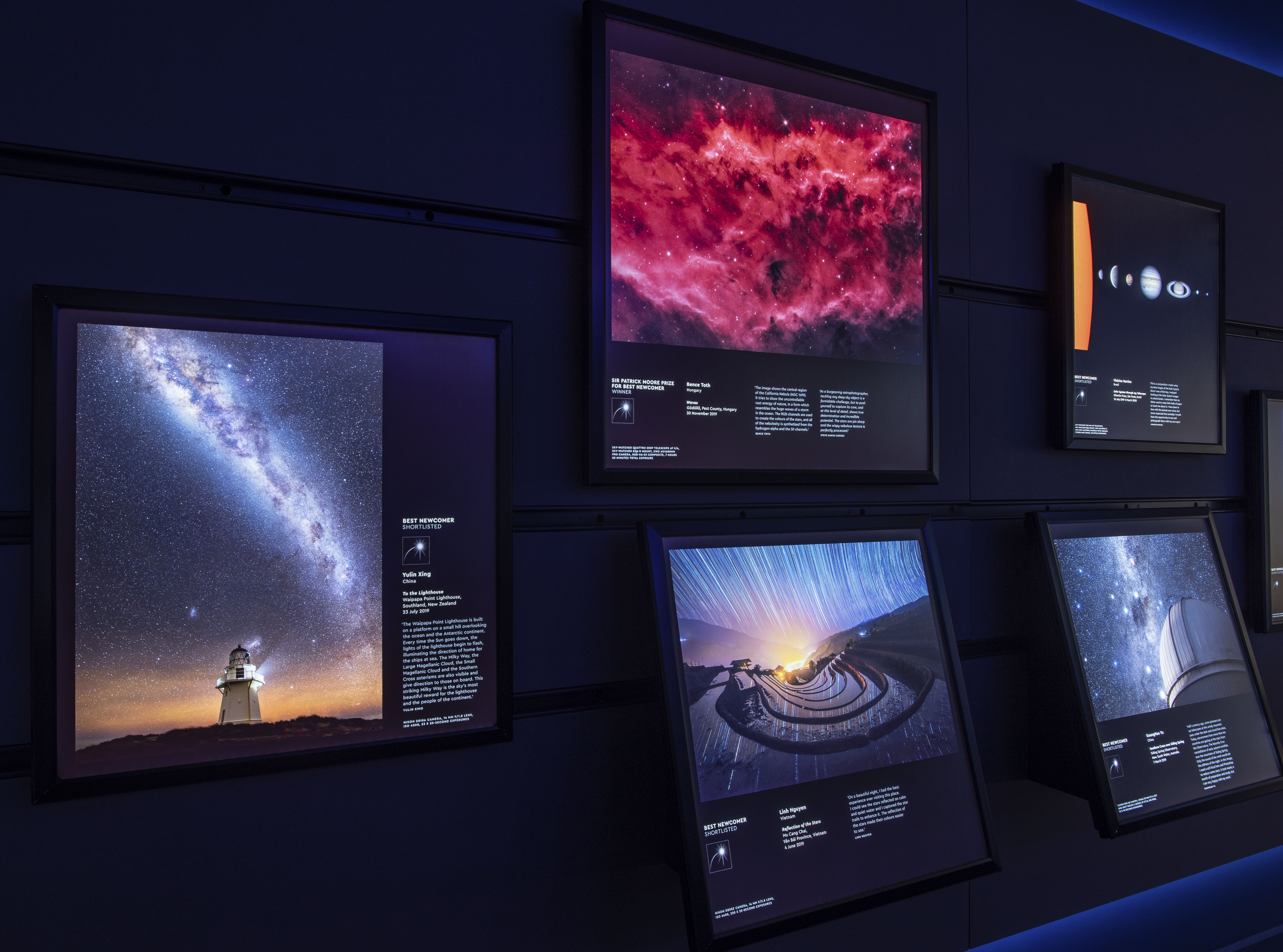 Astronomy Photography Gallery with framed photos, ideal for events and seminars.