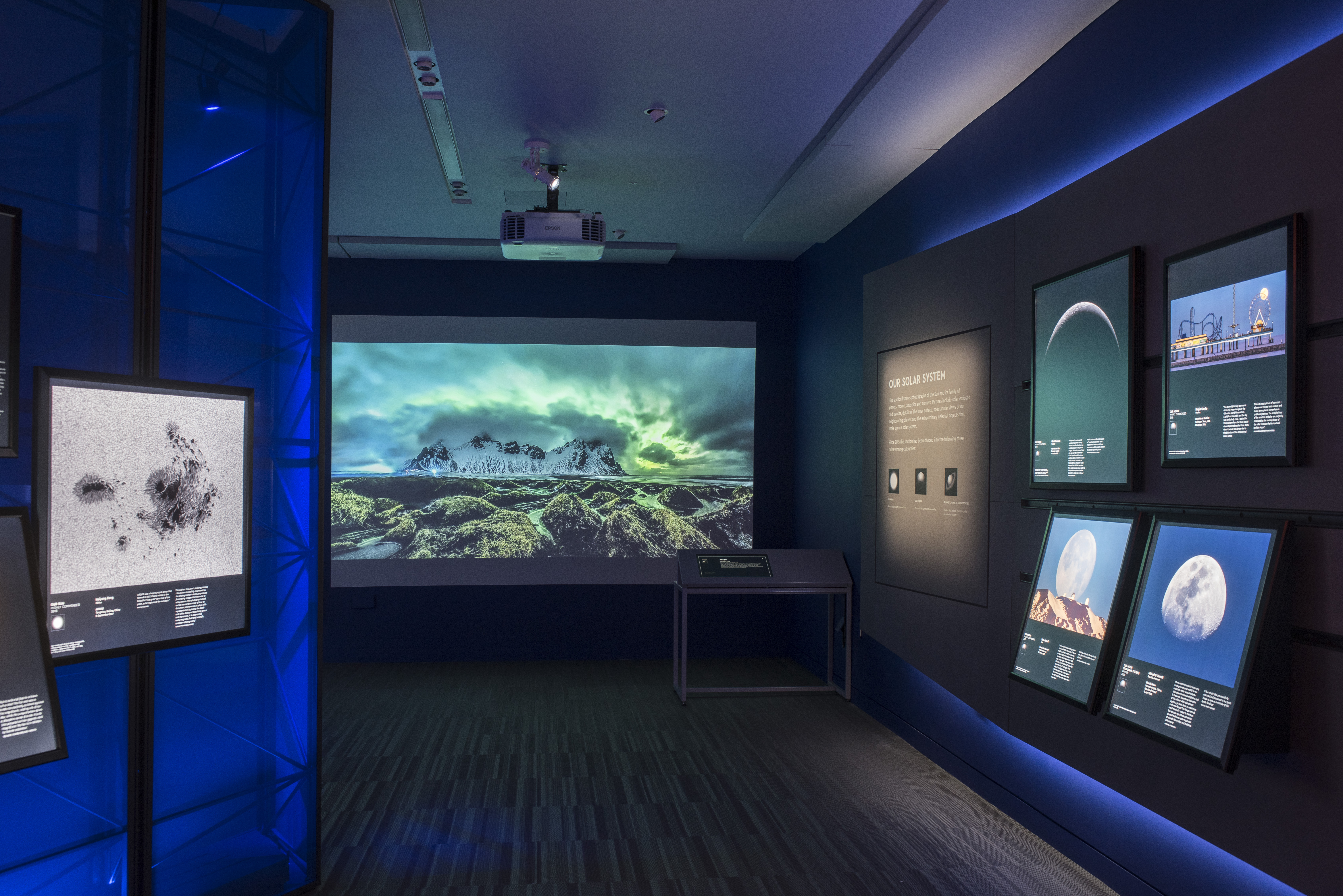 Astronomy exhibition at National Maritime Museum with sleek design for workshops.