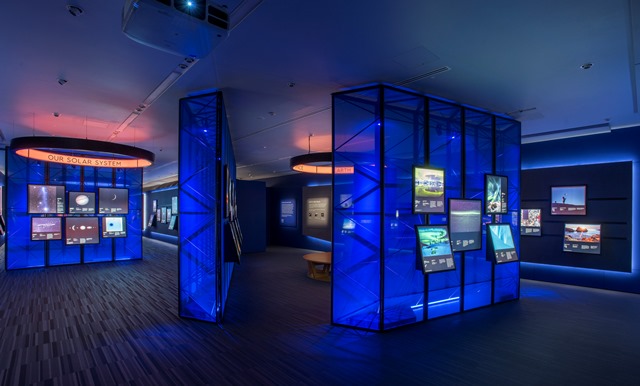 Astronomy Photography Gallery with blue lighting, ideal for networking events and launches.