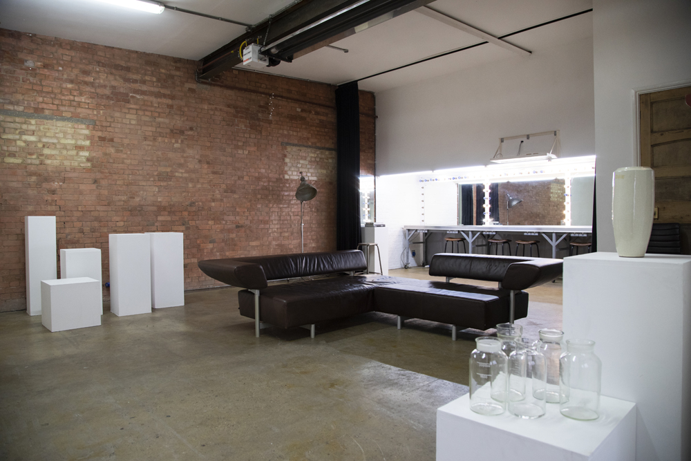Versatile event space in Bow Bunker, East London with exposed brick and natural light.