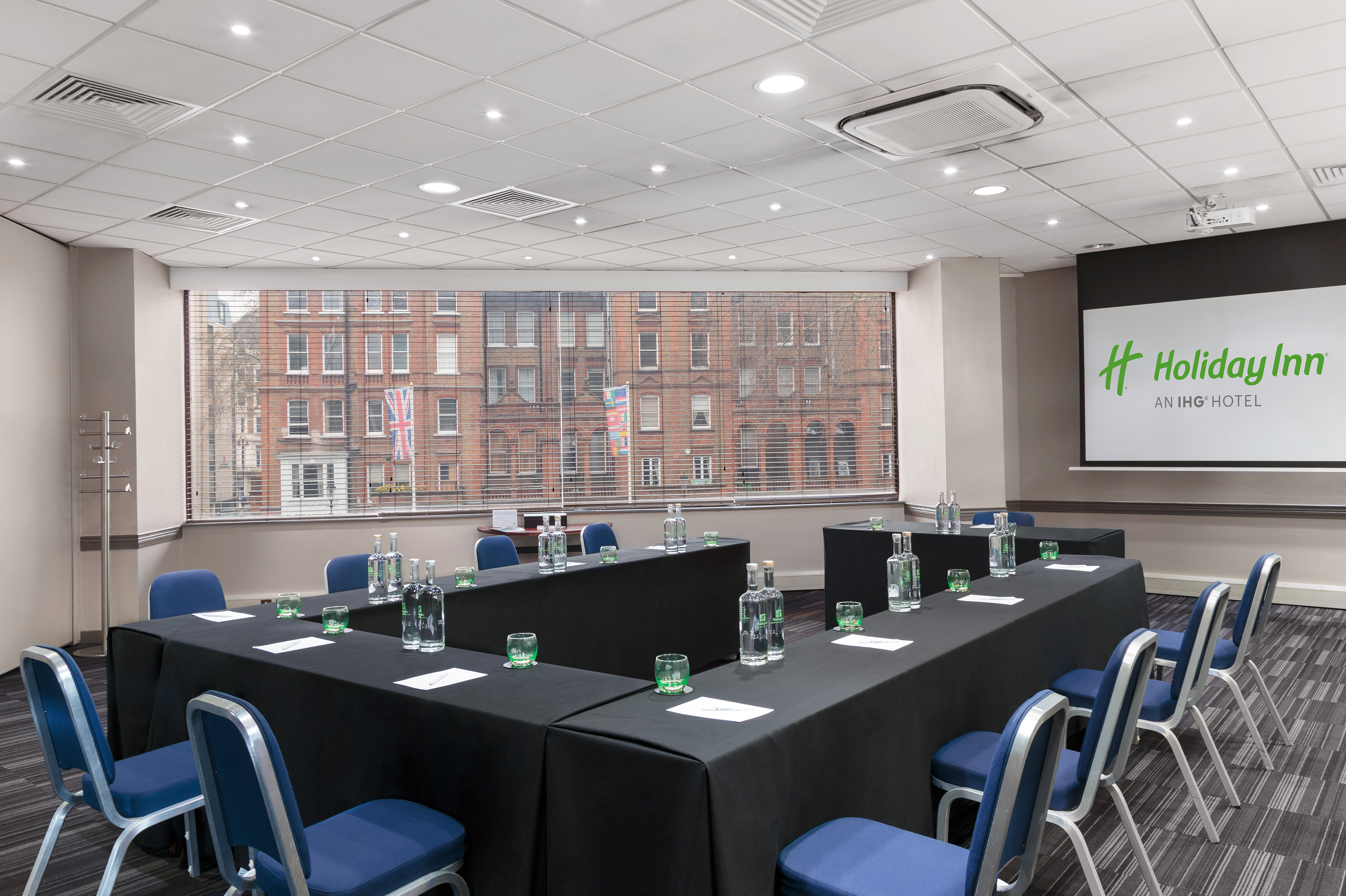 Madonna in a bright meeting room at Holiday Inn, perfect for corporate events and workshops.