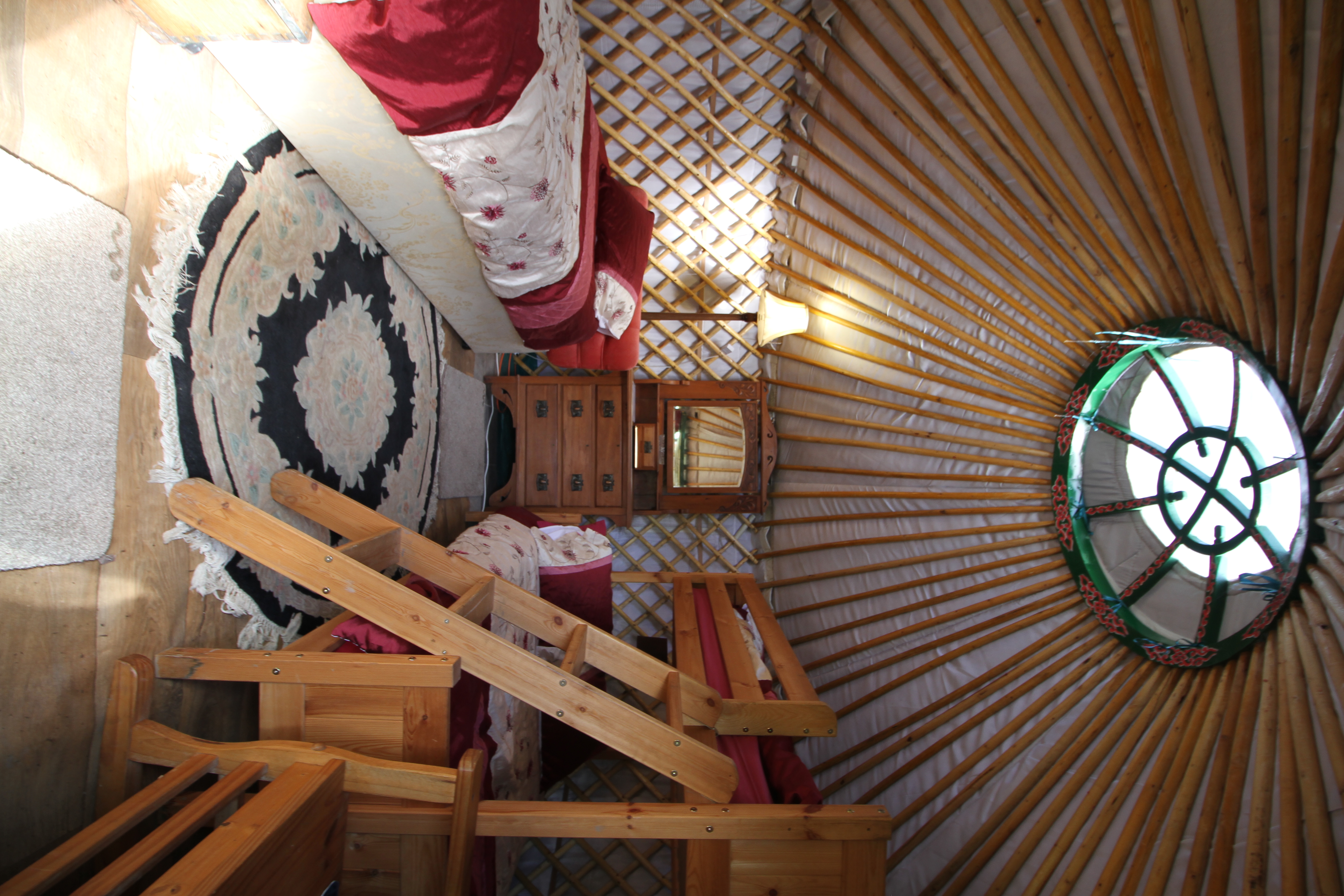 Cozy yurt interior at Barnutopia for unique retreats and team-building events.