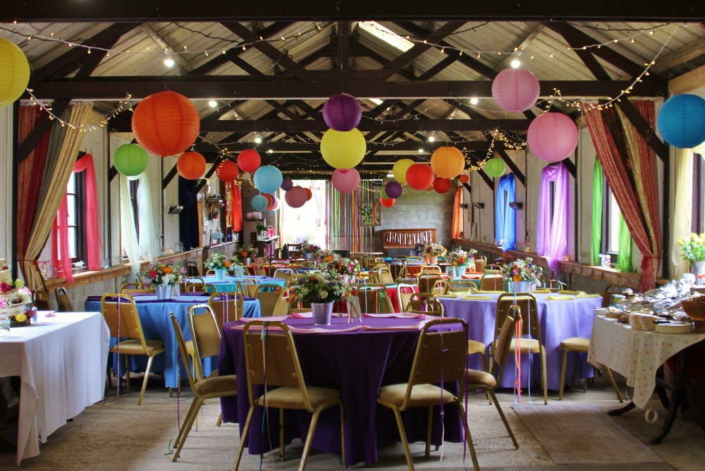 Vibrant event space at Barnutopia with colorful lanterns for celebrations and gatherings.