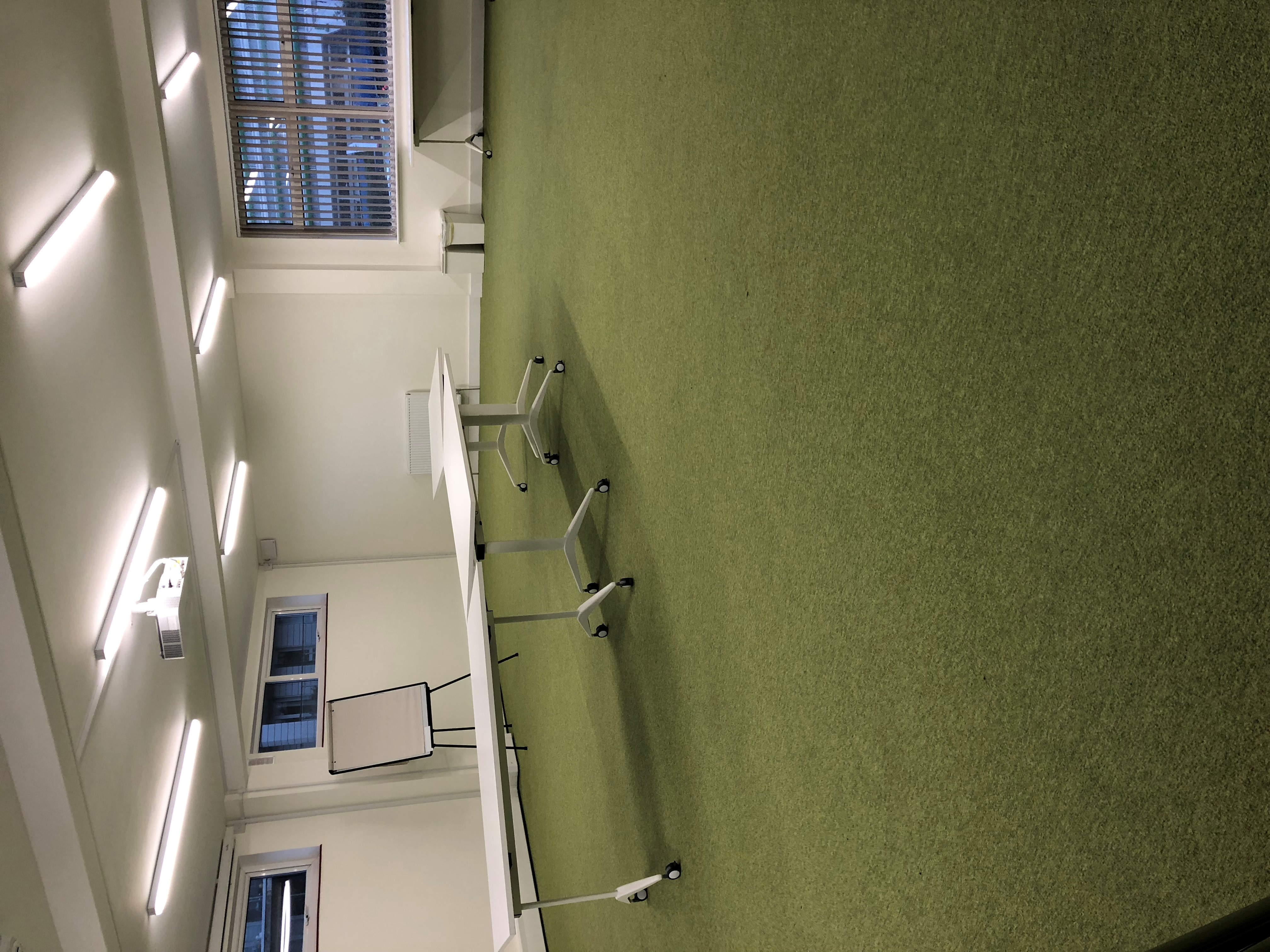 Versatile training room with movable tables, ideal for workshops in SEIDs Hub Wembley.