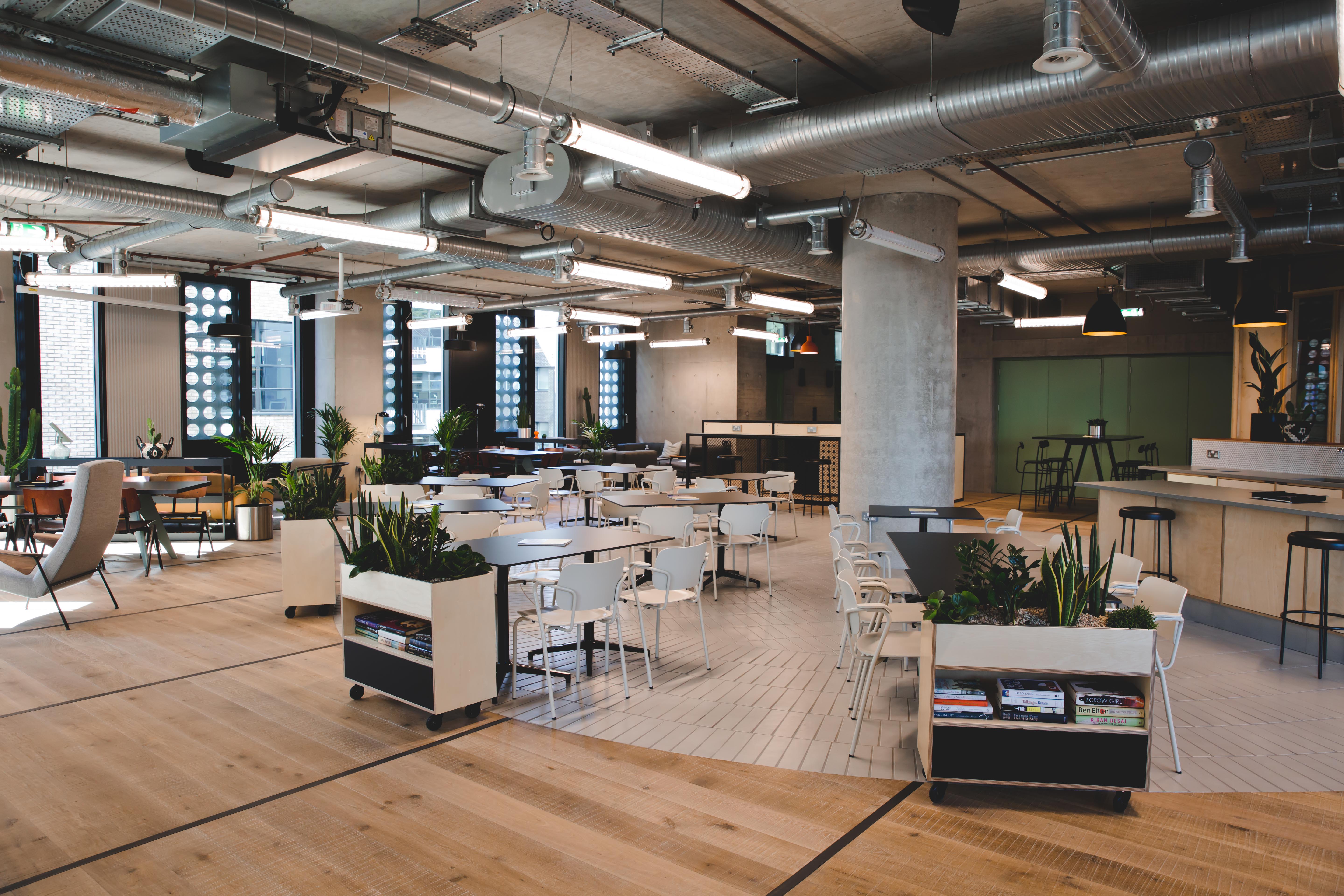 Modern lounge at FORA - White Collar Factory, perfect for workshops and networking events.