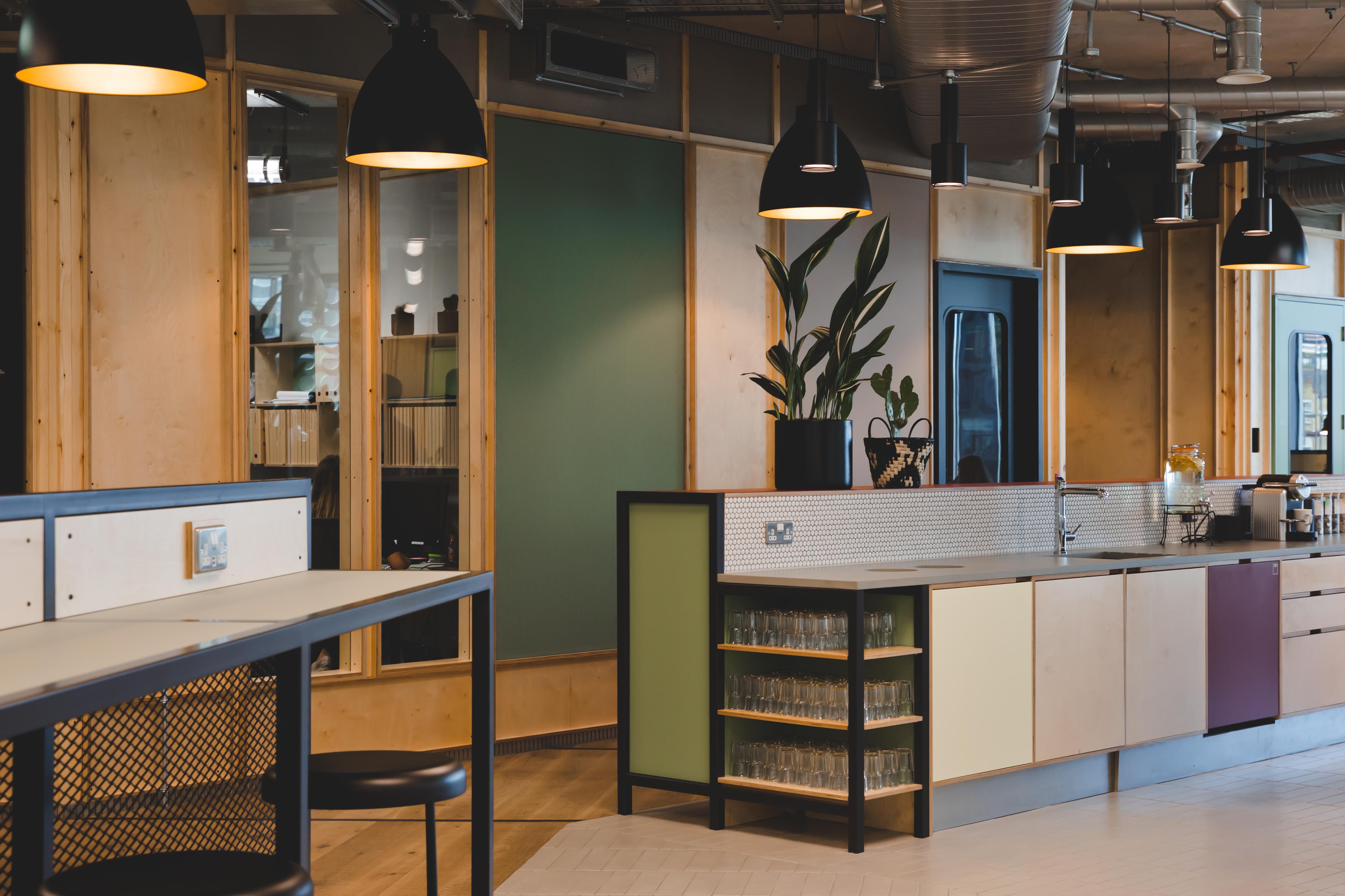 Modern lounge area in FORA - White Collar Factory, perfect for meetings and networking events.