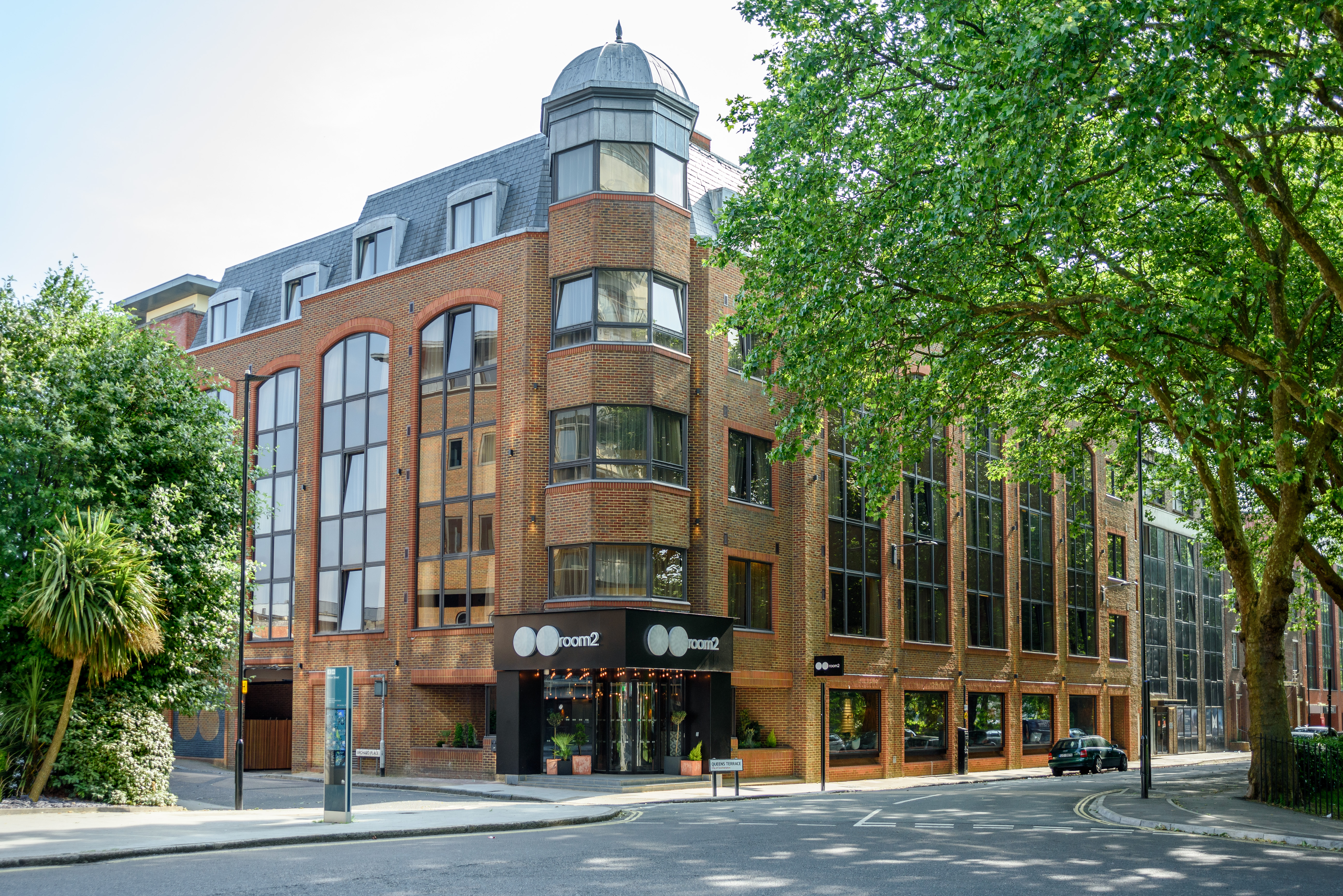 Modern venue with large windows for corporate events and creative workshops.