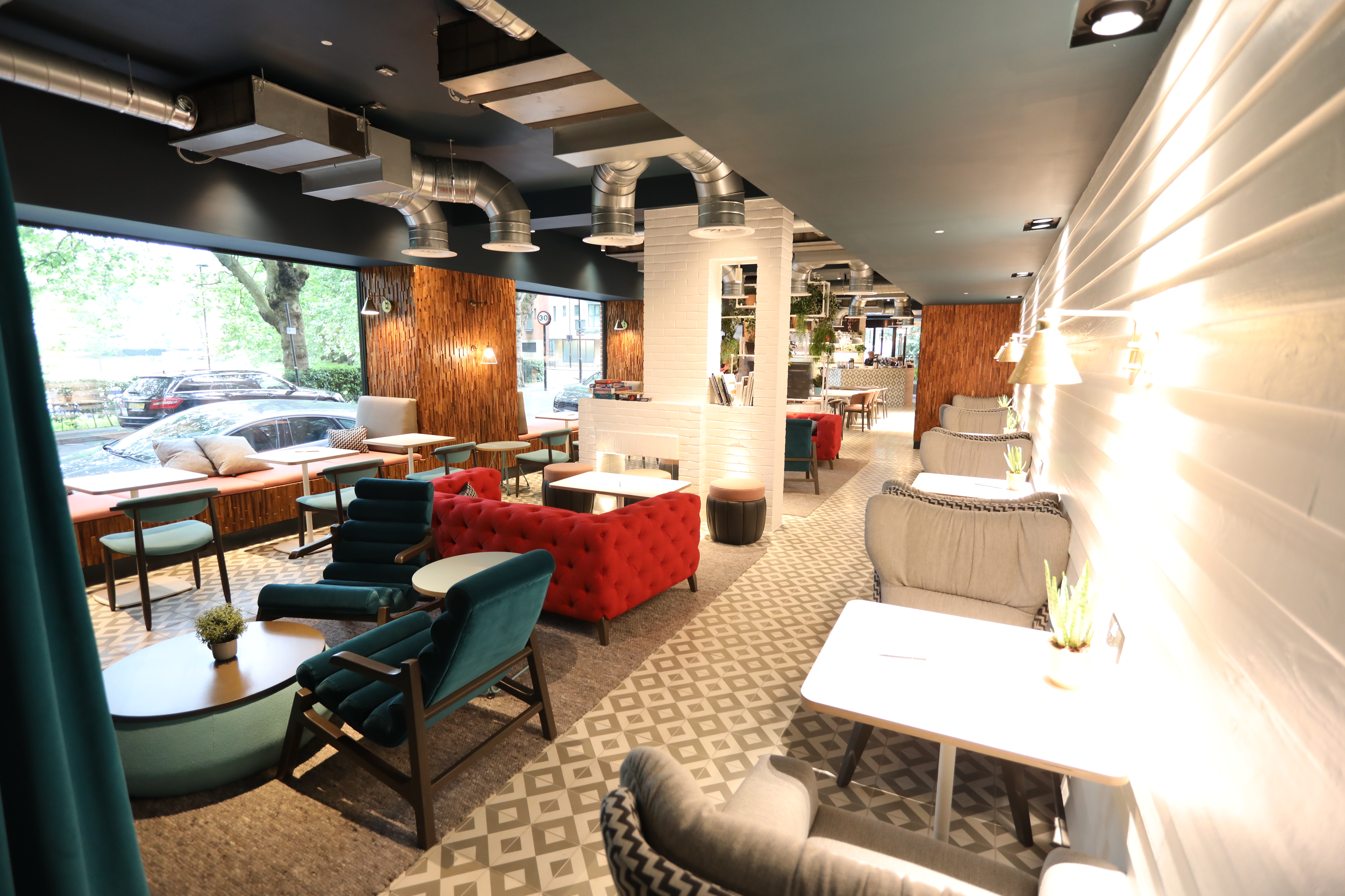 Modern event space with comfortable seating for casual meetings and networking.