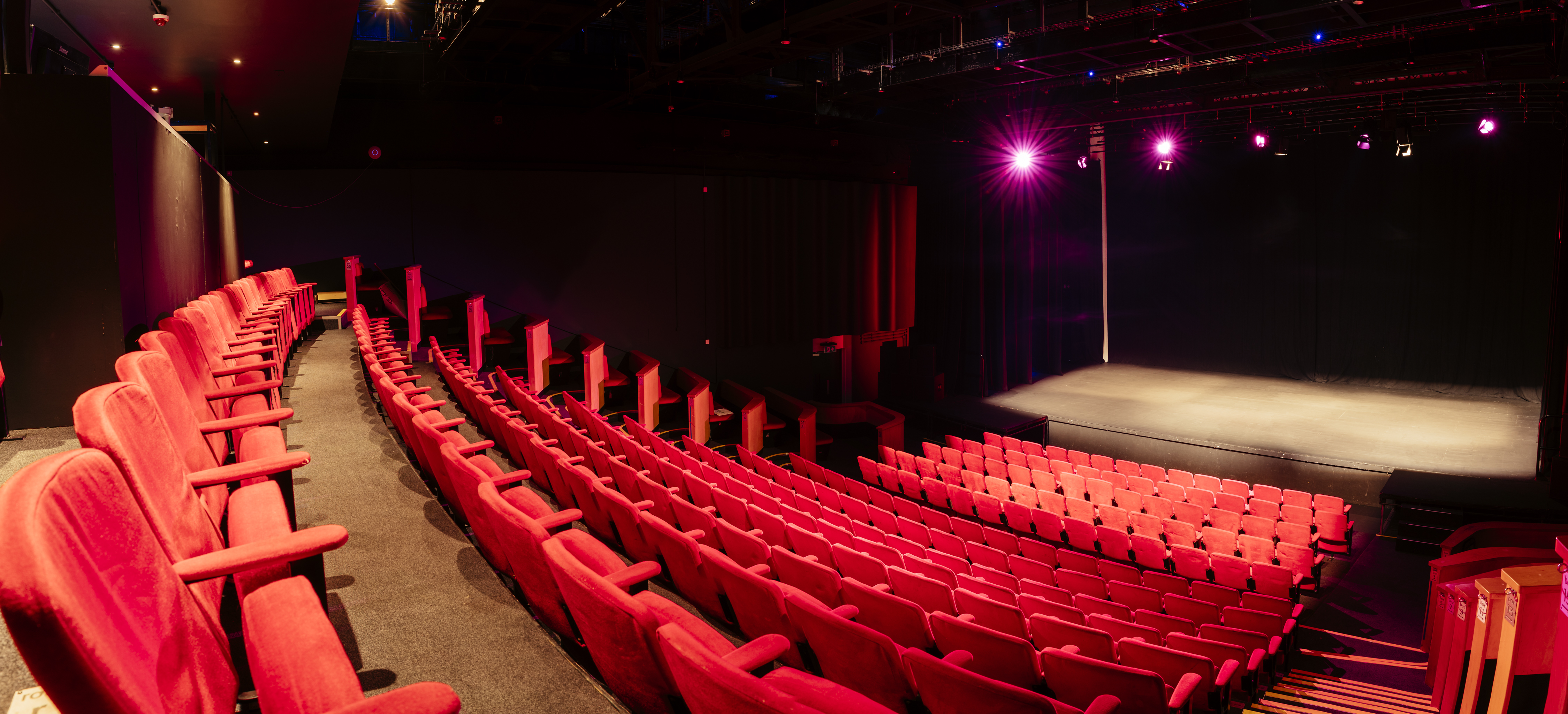 Space 1 in Contact Theatre with tiered seating, ideal for presentations and performances.