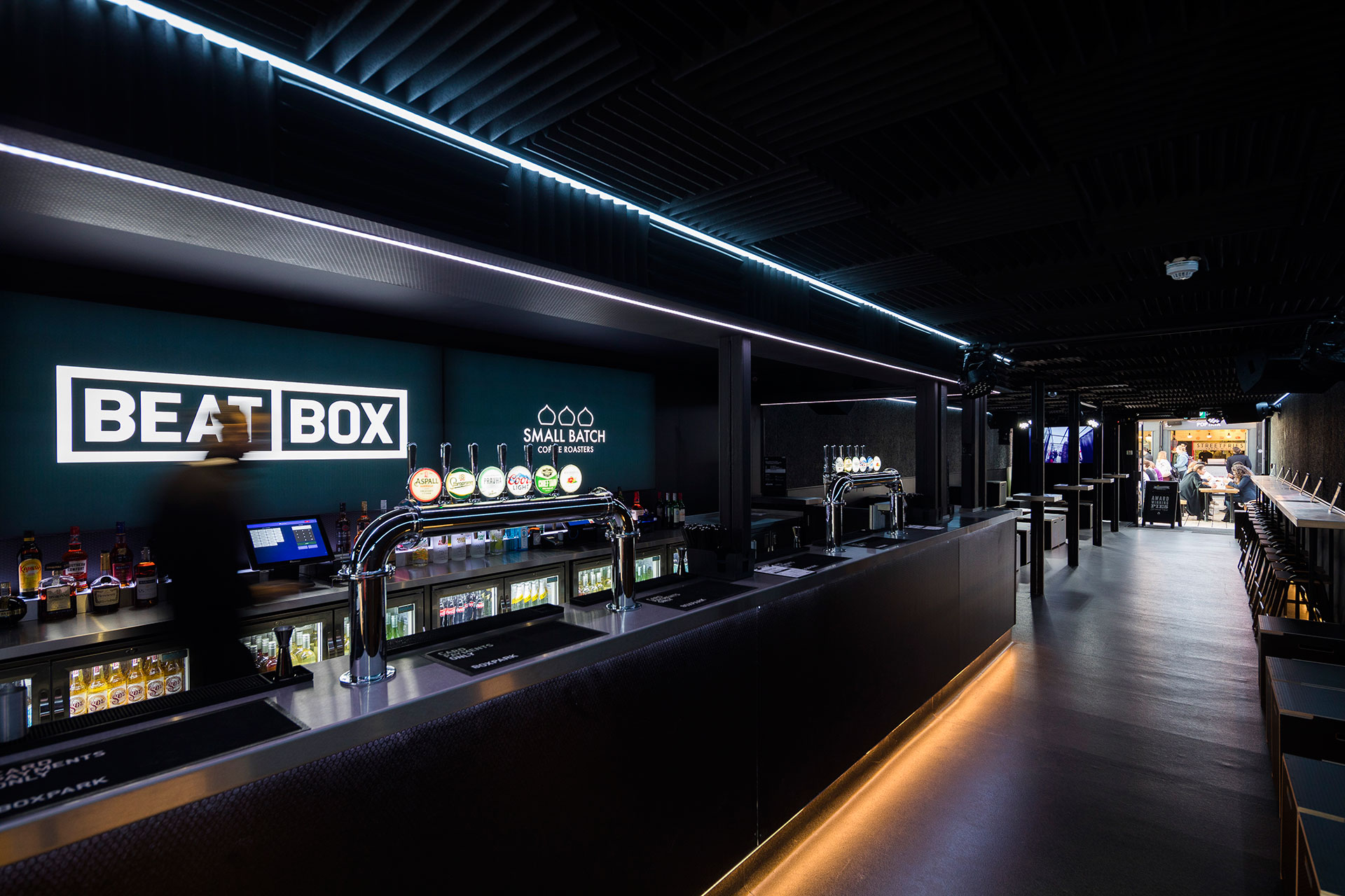 Sleek bar at BeatBox, Boxpark Shoreditch, perfect for events and social gatherings.