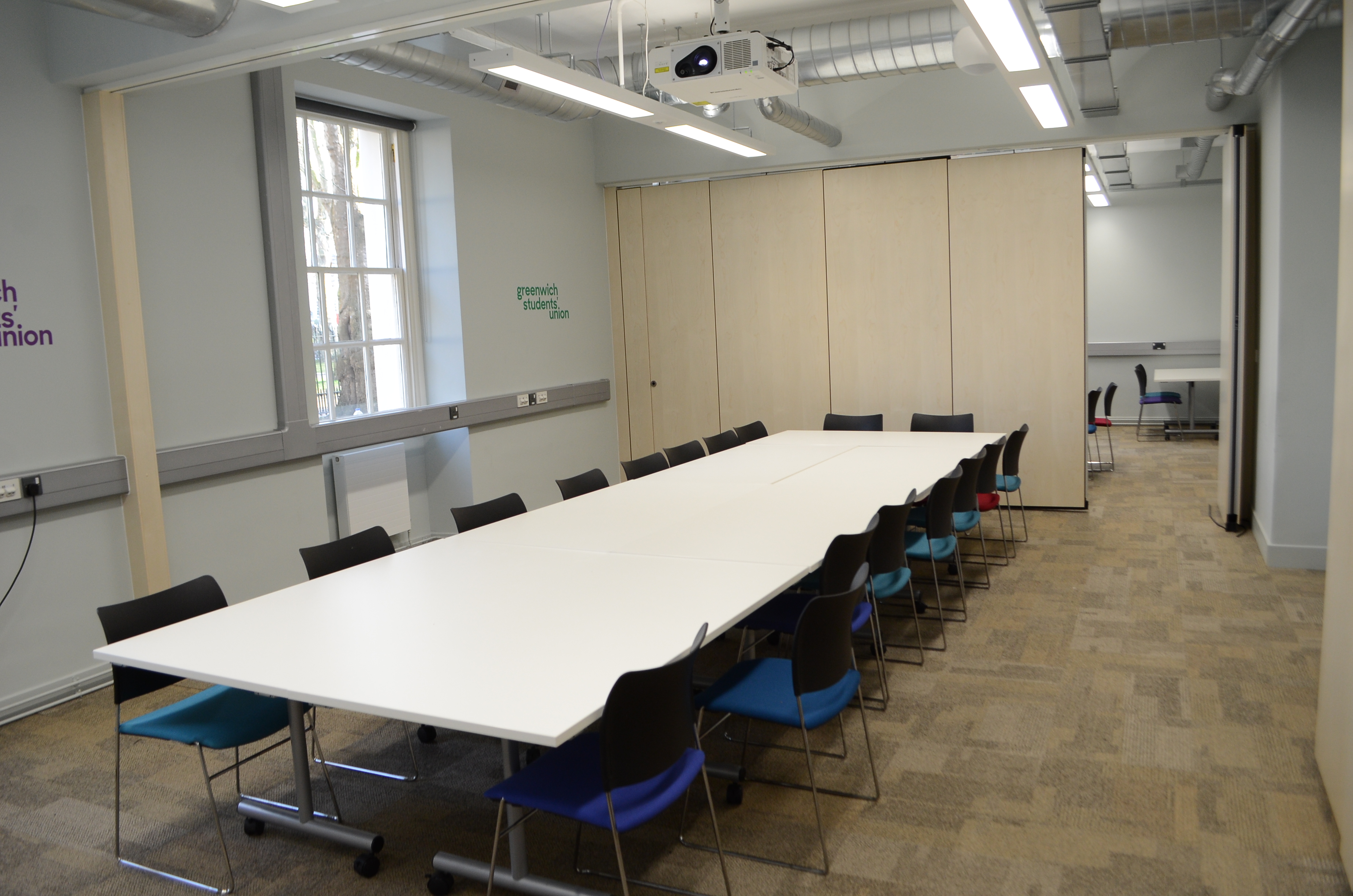 Board Room in Dreadnought with long white table, ideal for workshops and meetings.