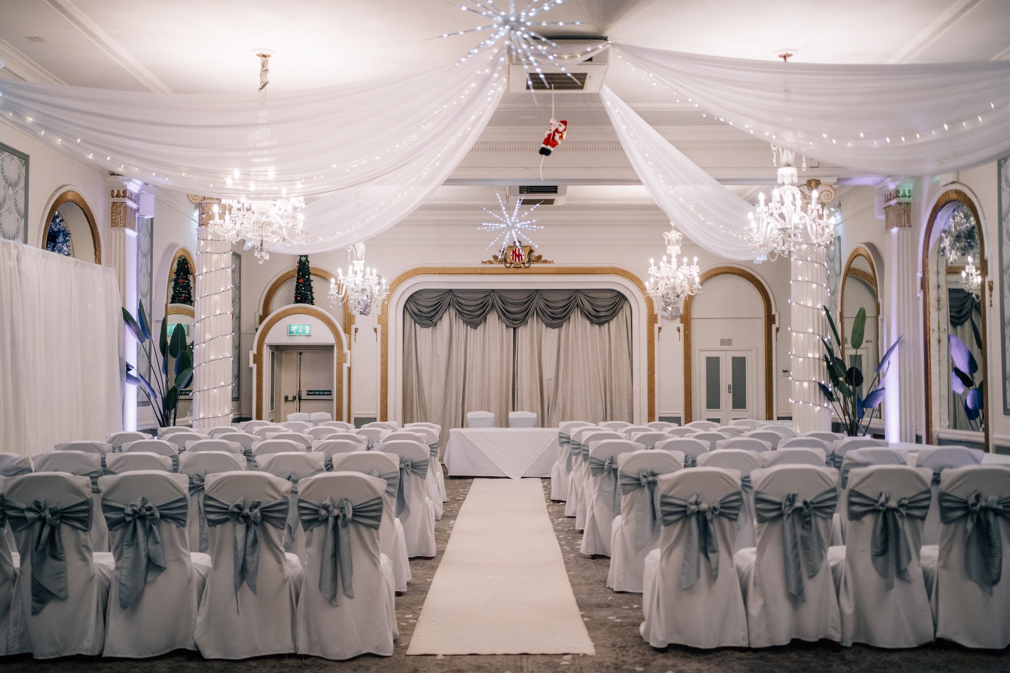 Norfolk Suite at Mercure Brighton: elegant wedding venue with drapery and lights.