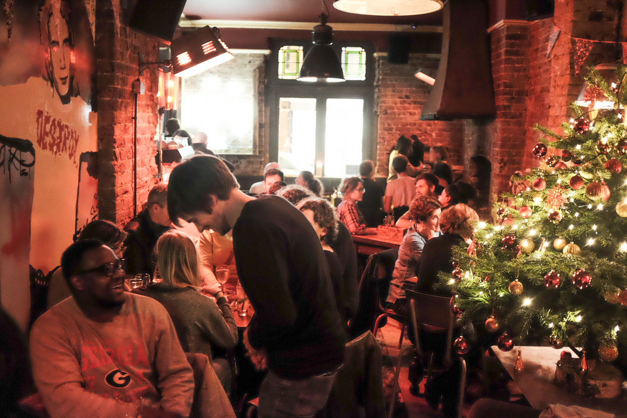 Cozy semi-private pub area at Ladywell Tavern, ideal for holiday parties and gatherings.