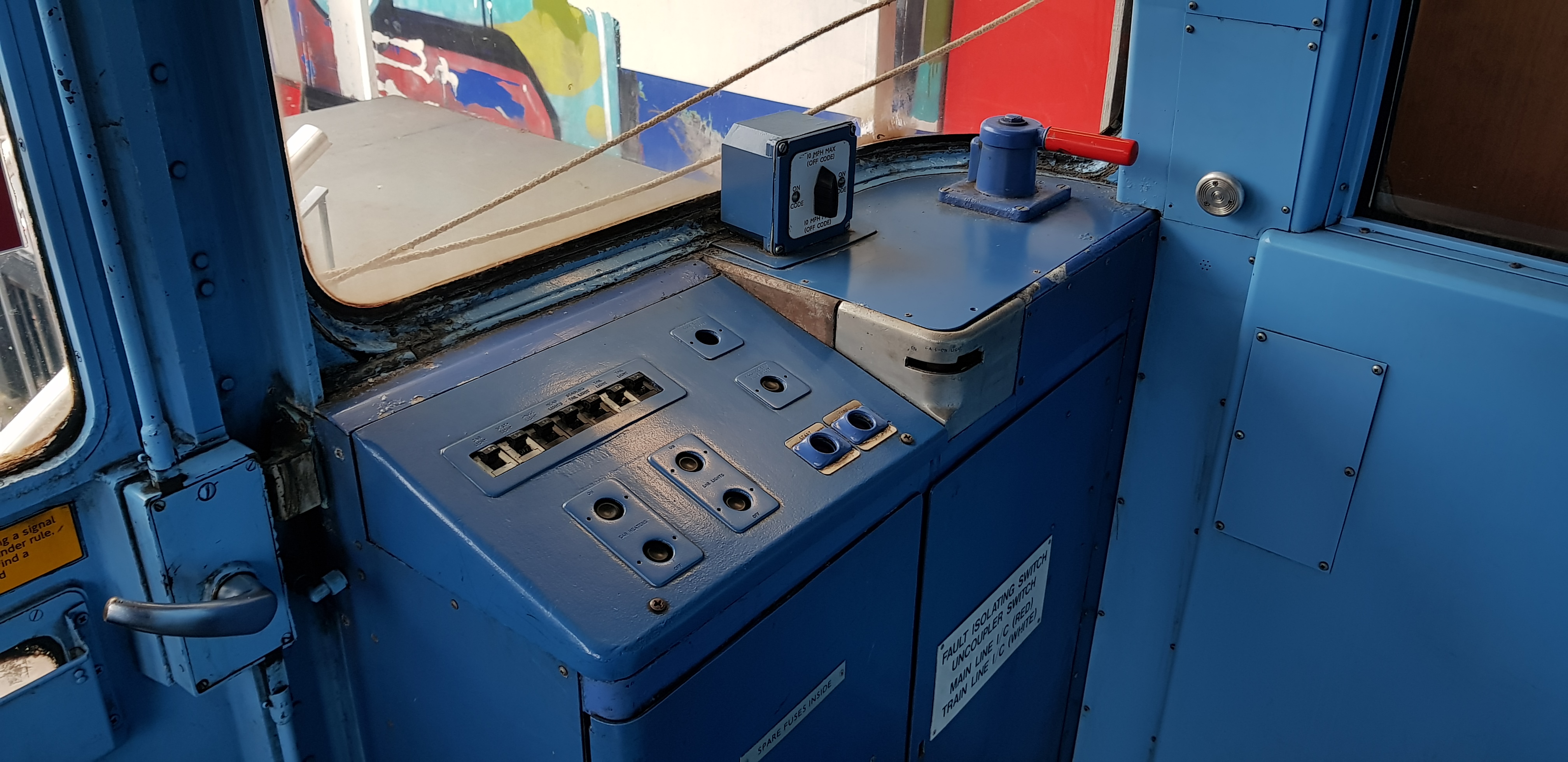 Victoria Line cab control panel at Walthamstow Museum, ideal for themed events and tours.