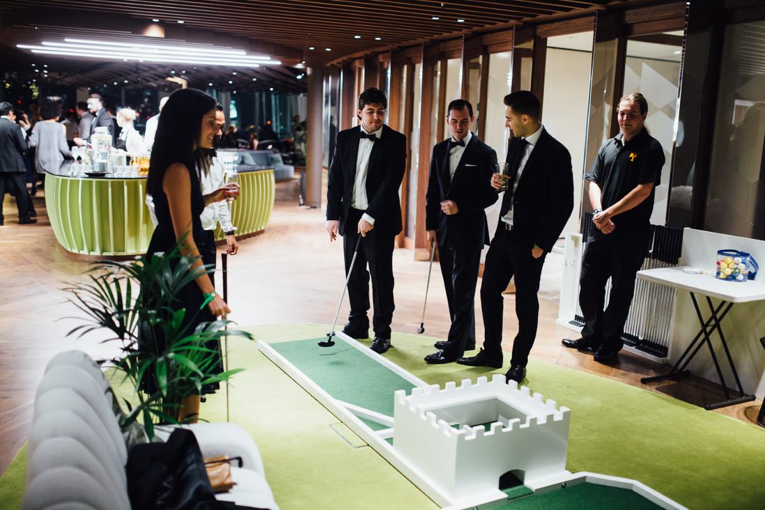 Corporate networking event at FORA The Shard with a portable putting green.
