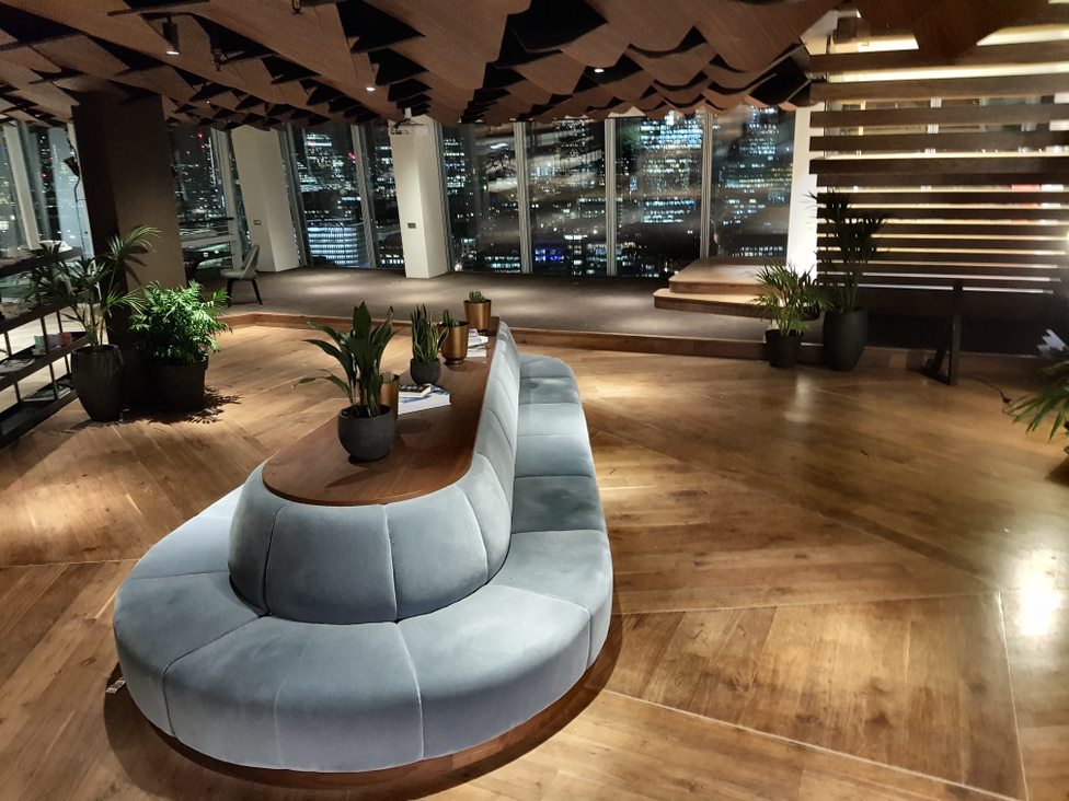Modern lounge with curved sofa for high-impact networking and VIP corporate events at The Shard.
