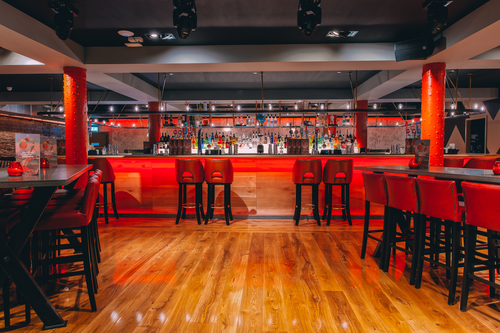 Skye Bar in Glasgow with vibrant red accents, ideal for networking events and gatherings.