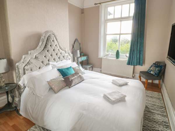 Elegant guest room in Whole Space, Peak Manor for luxury events and relaxation.