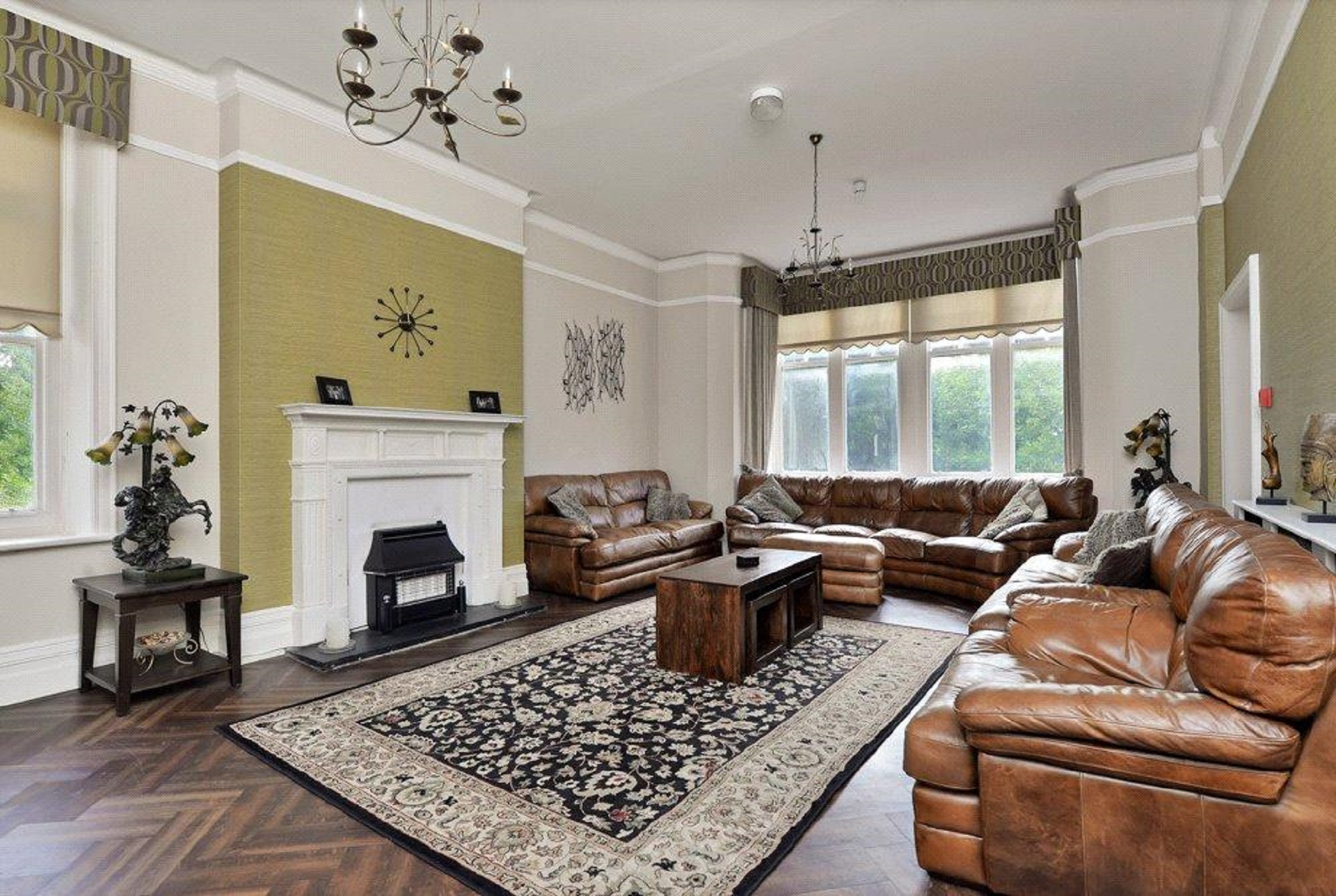 Elegant lounge with leather seating at Whole Space, Peak Manor for meetings and events.