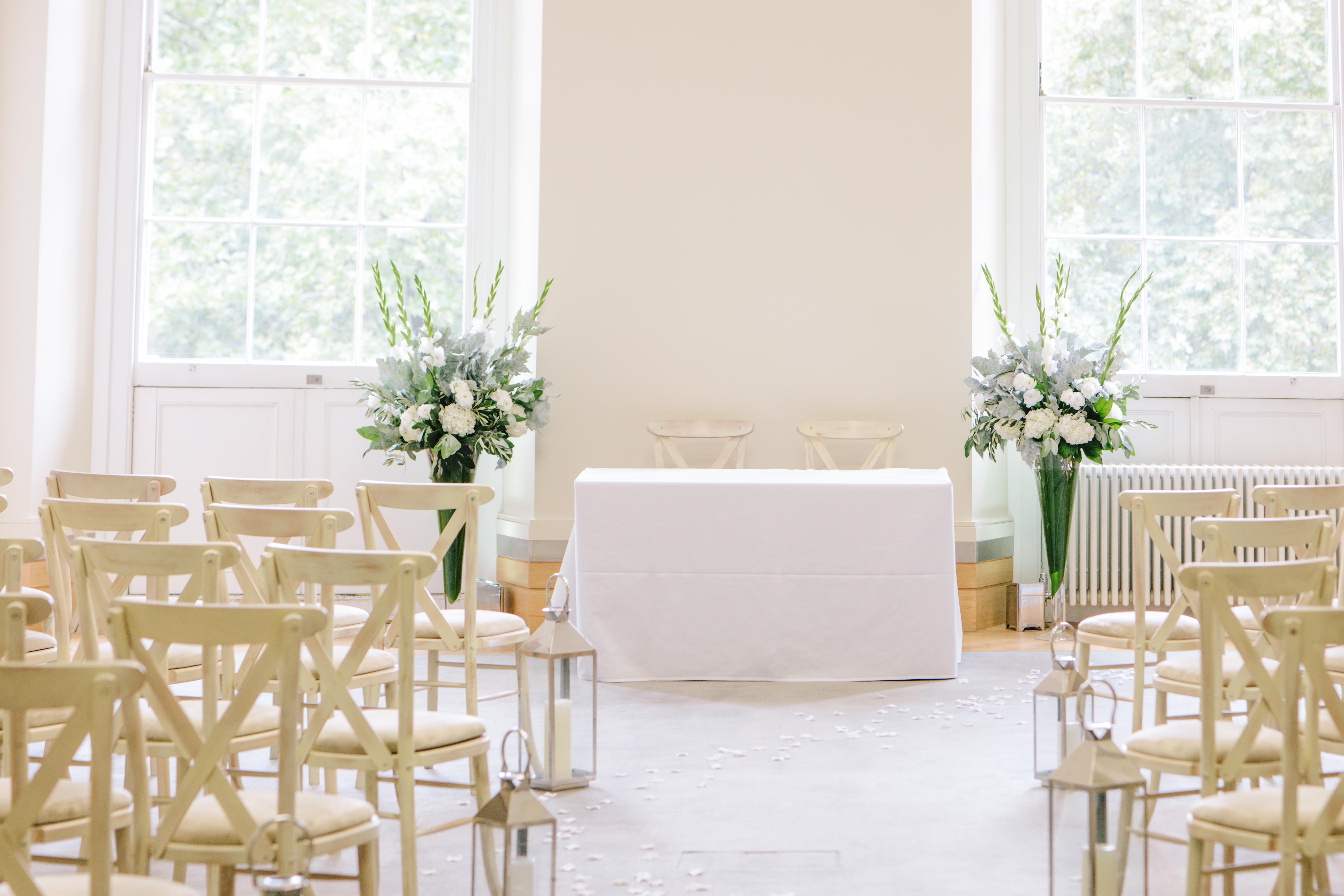 Elegant wedding venue at Prince Philip House with white floral arrangements.