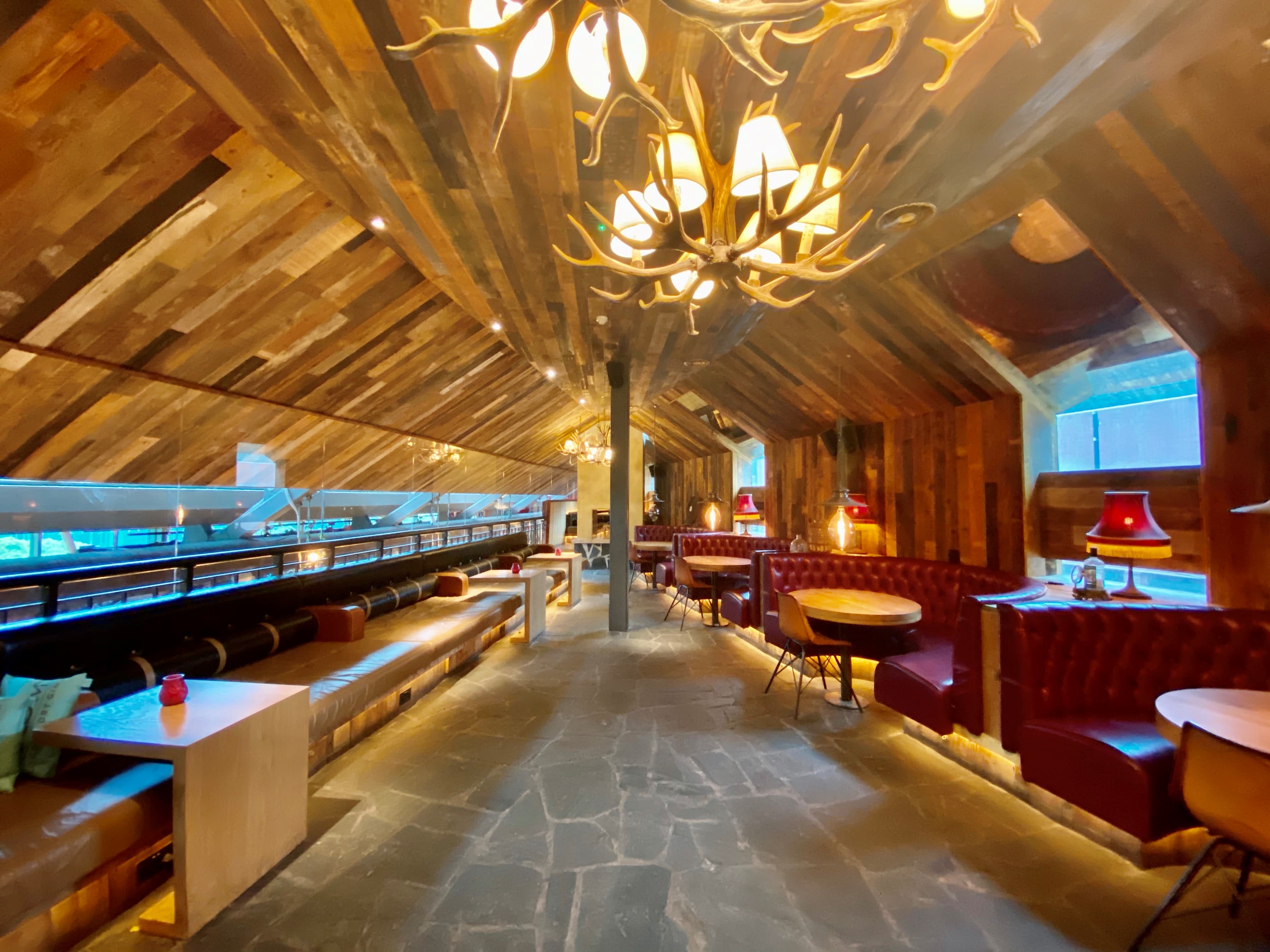 Stylish Gin Nest venue with rustic beams, perfect for networking events and gatherings.