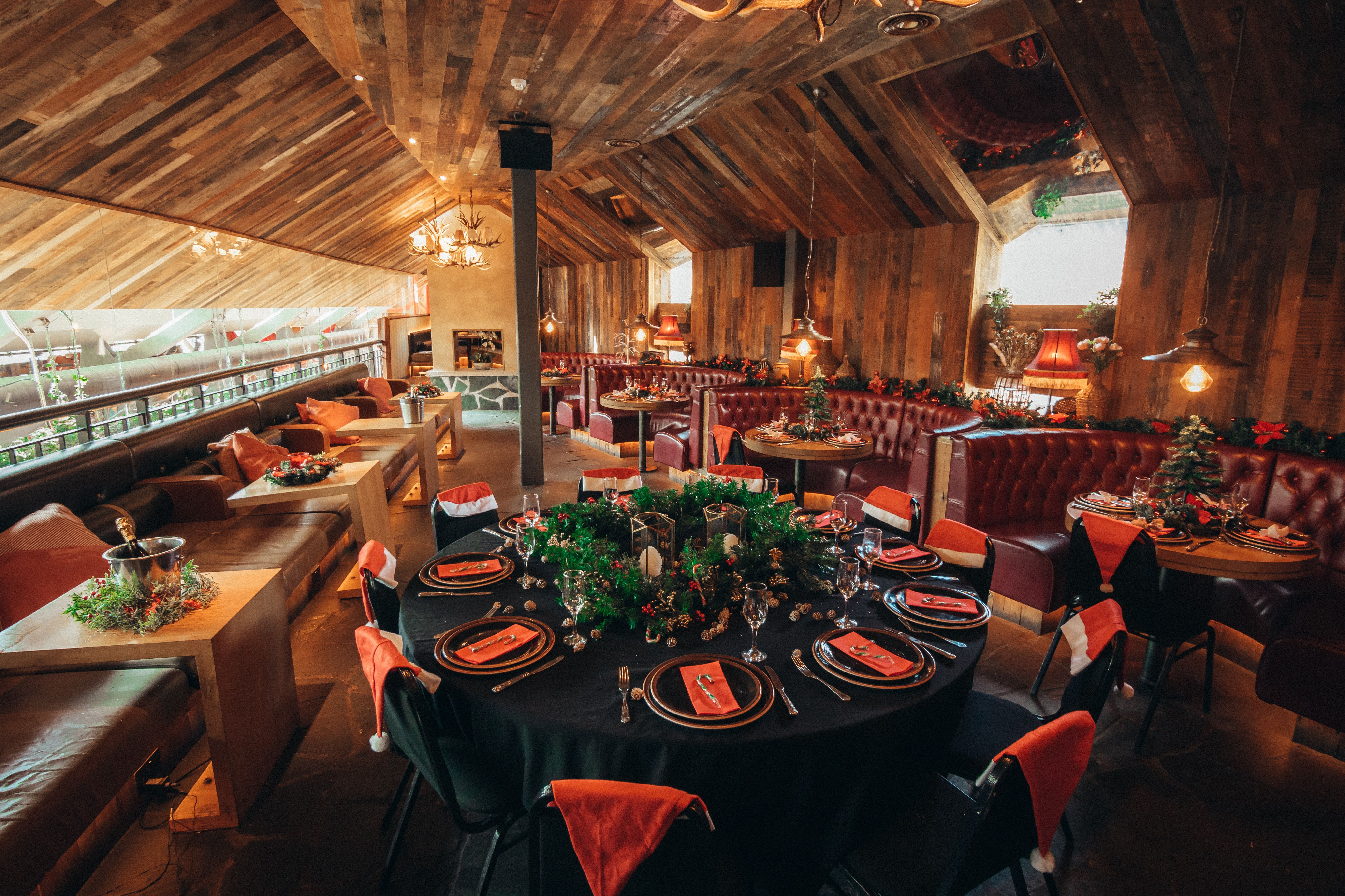 "Rustic event space at Gin Nest, ideal for intimate gatherings and holiday parties."