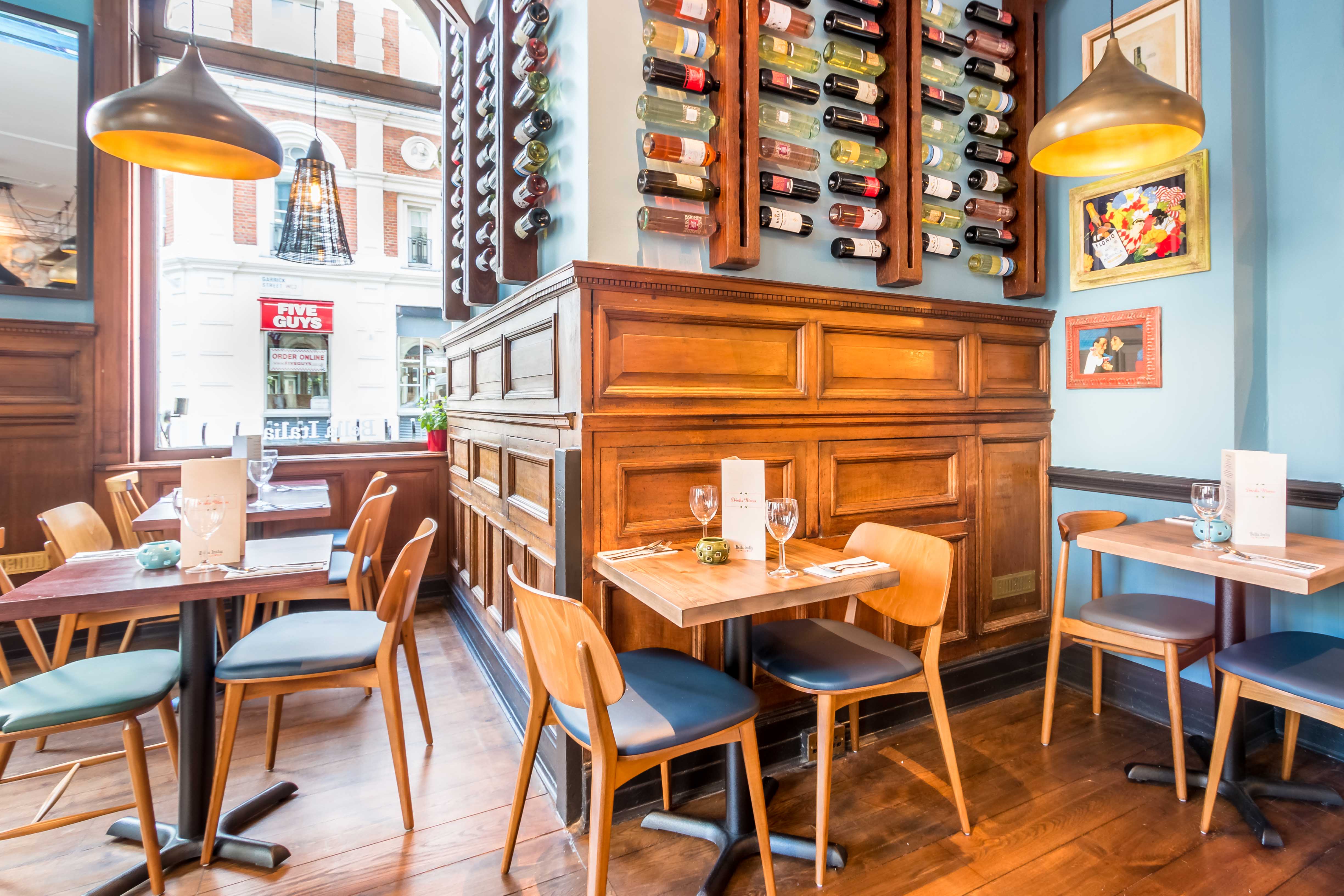 Stylish restaurant venue with warm wood tones, ideal for intimate meetings and events.