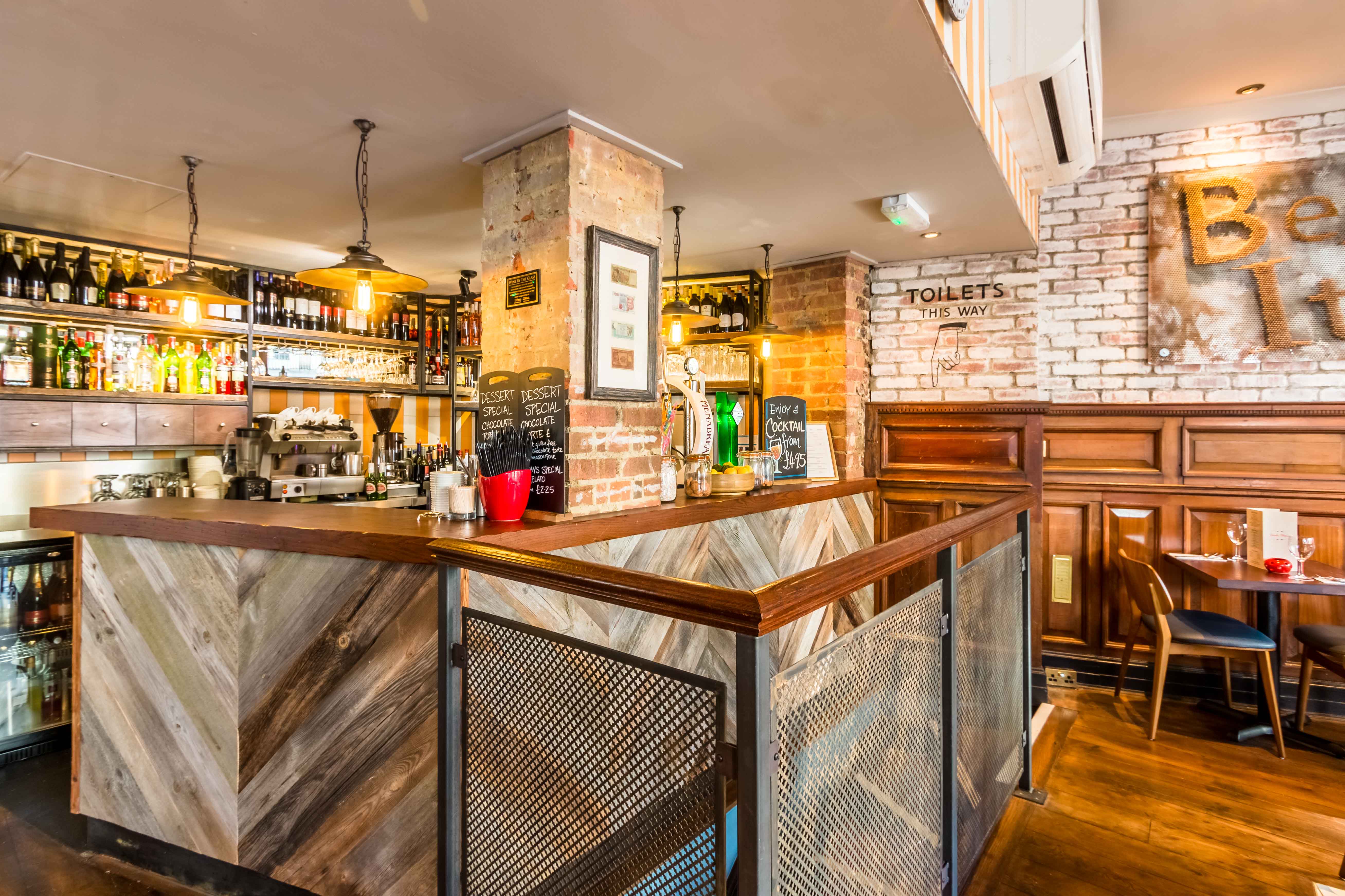 Stylish bar area in Bella Italia, ideal for networking events and informal meetings.