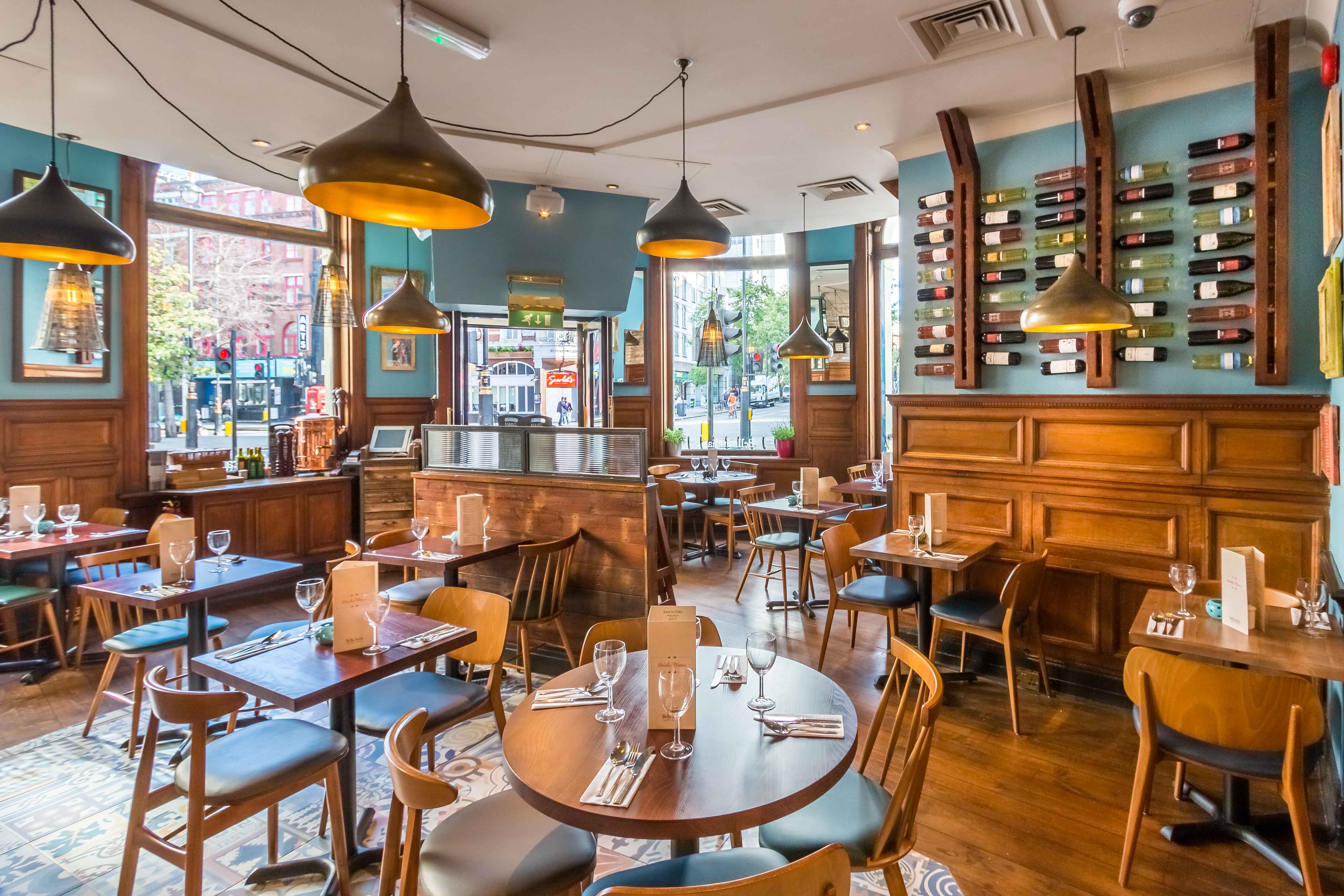 Stylish restaurant venue with warm wood tones, ideal for corporate events and gatherings.