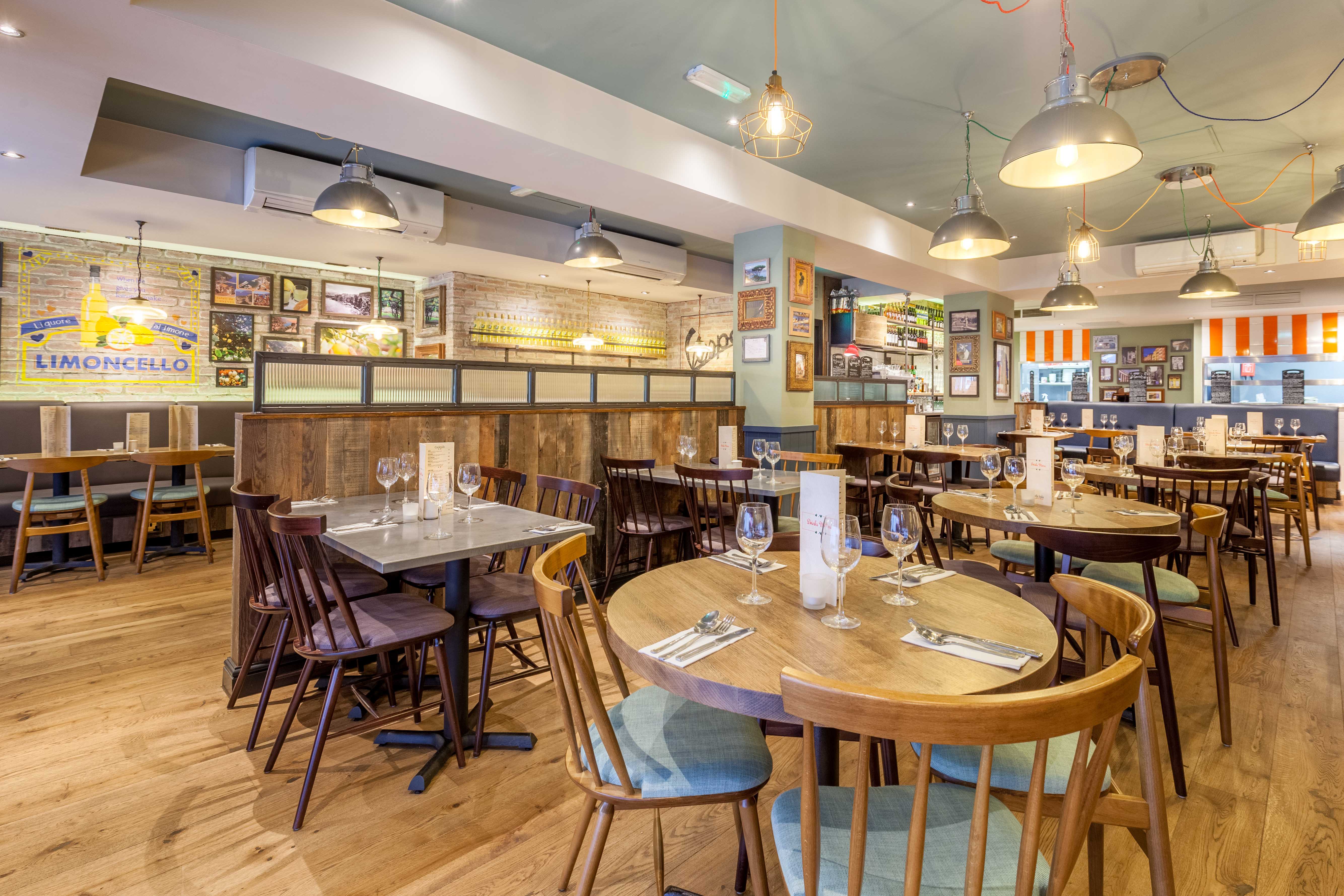 Cozy restaurant venue with warm wood tones for intimate meetings and events.